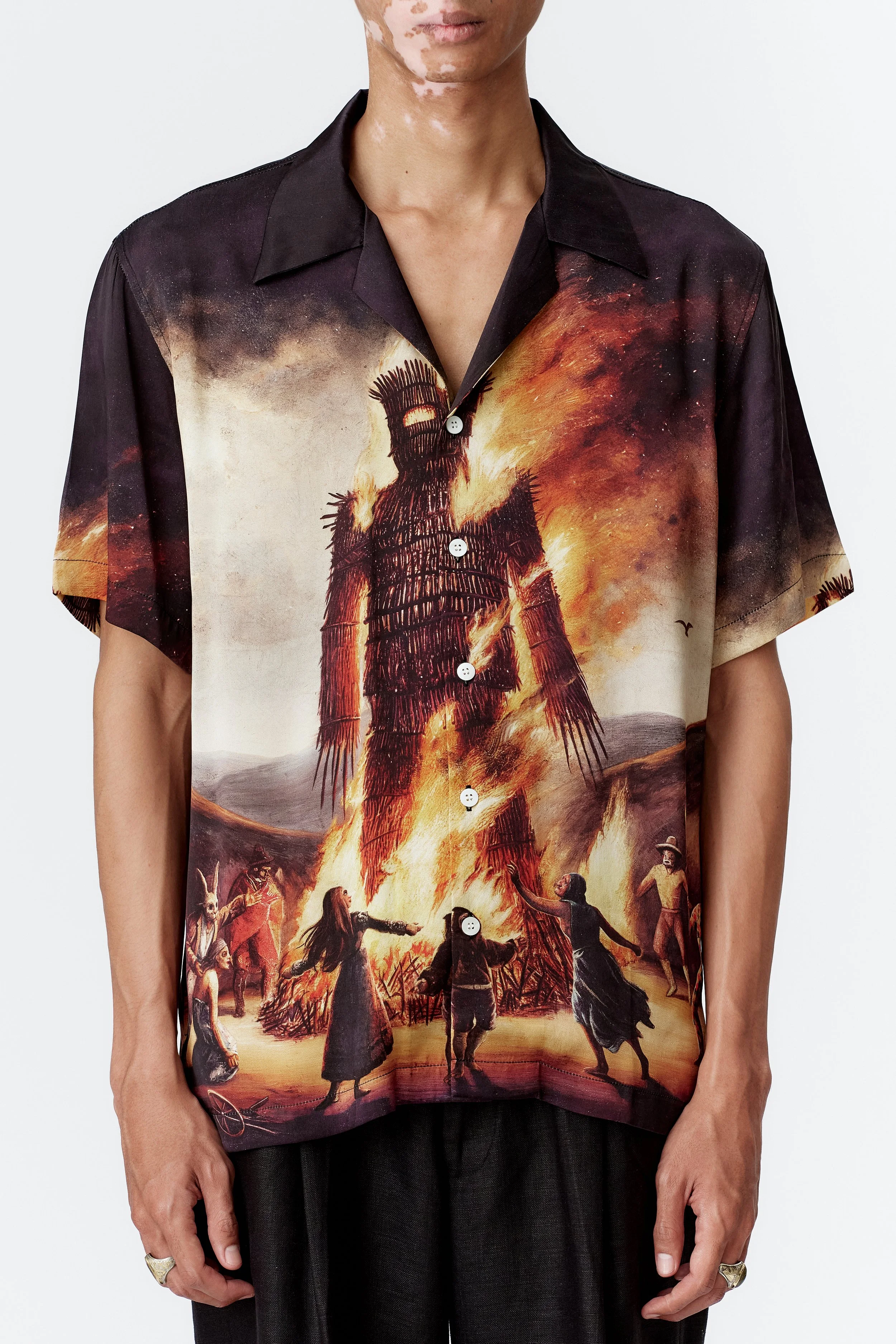 Close-up of Wickerman painting in all-over print on silk satin shirt