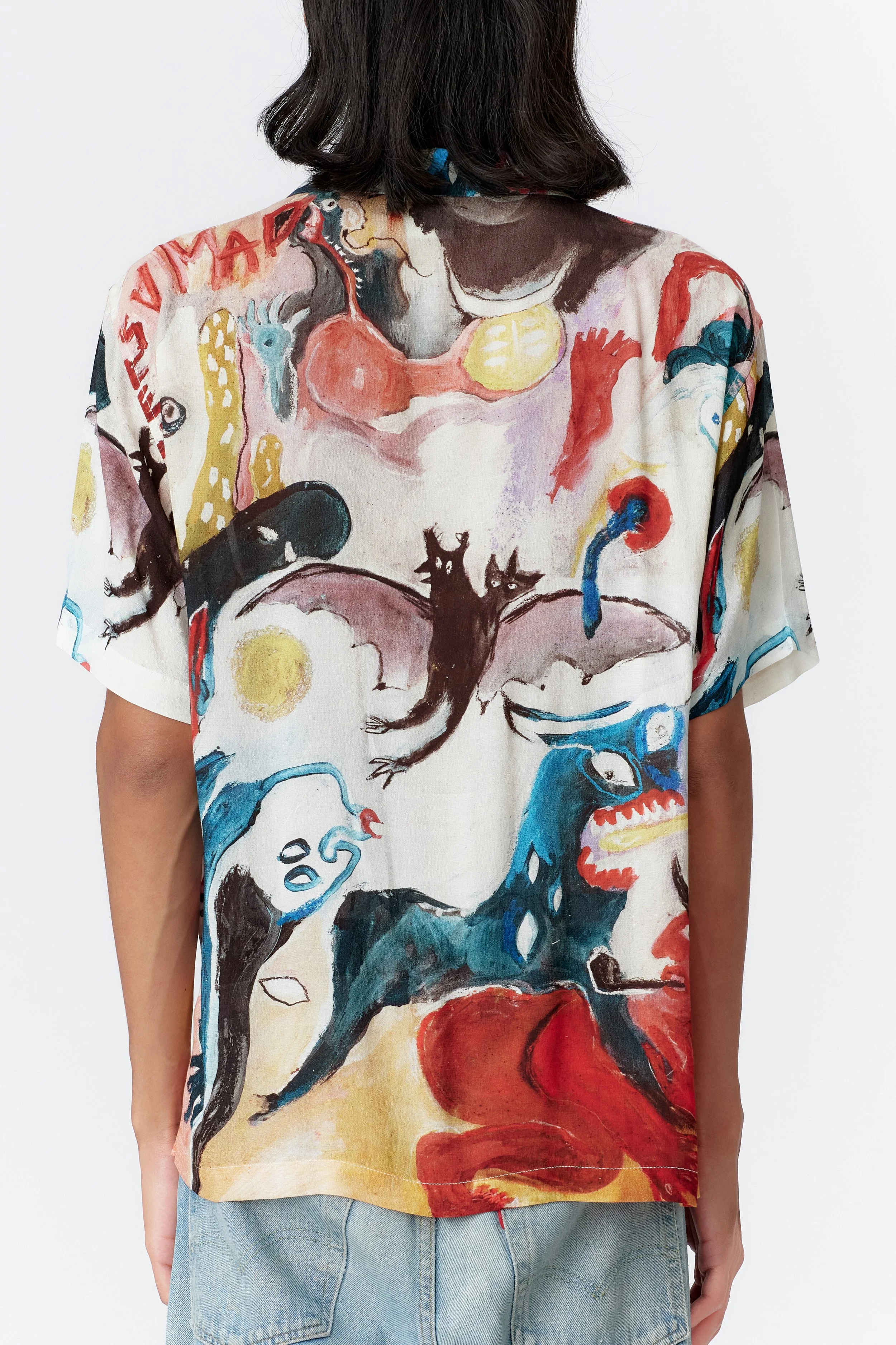 Rear close-up of MAD AS HELL shirt illustrating vivid multi-colored crepe rayon artwork by Alexandra Anderson