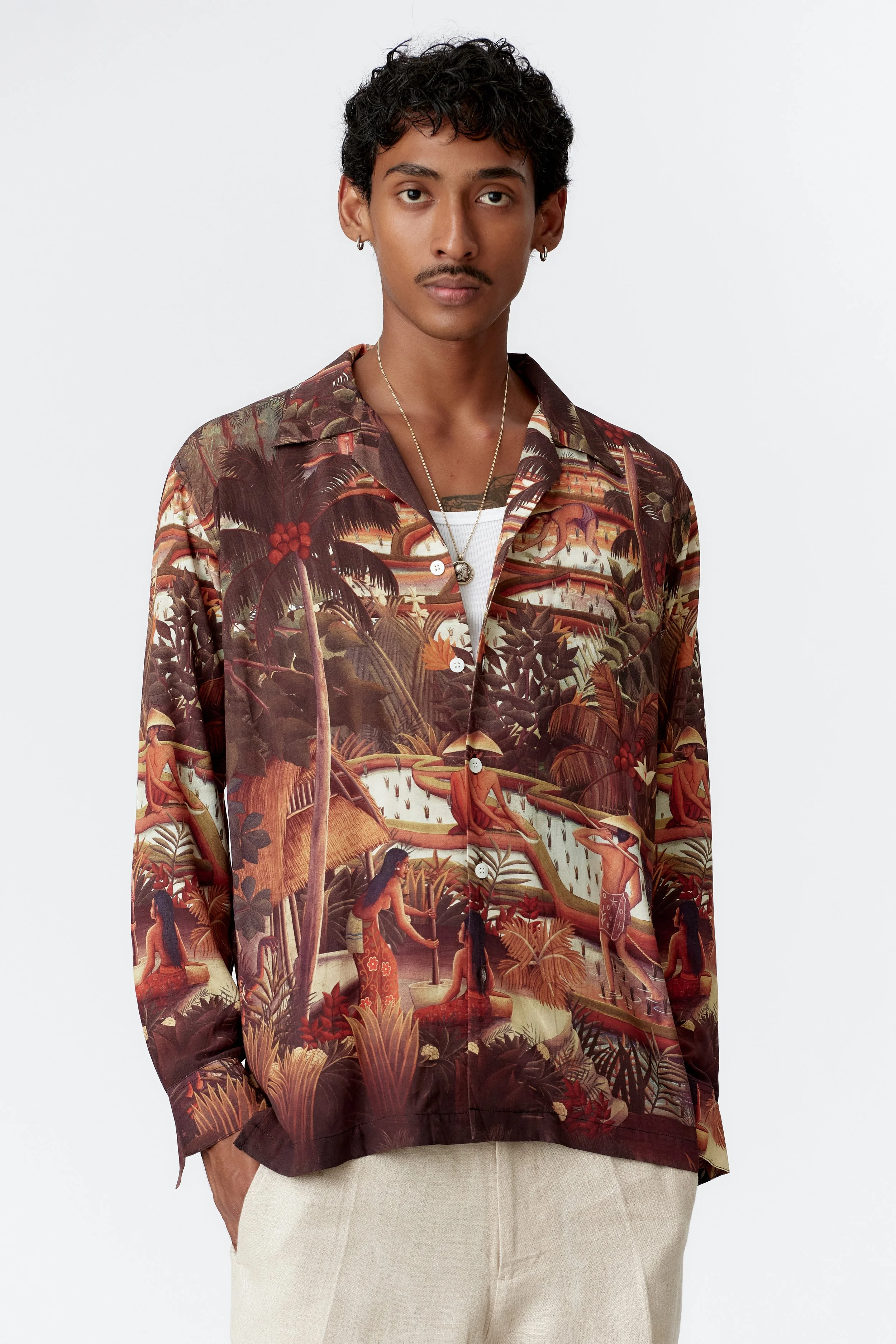 Three-quarter front view of Subak brown camp collar shirt