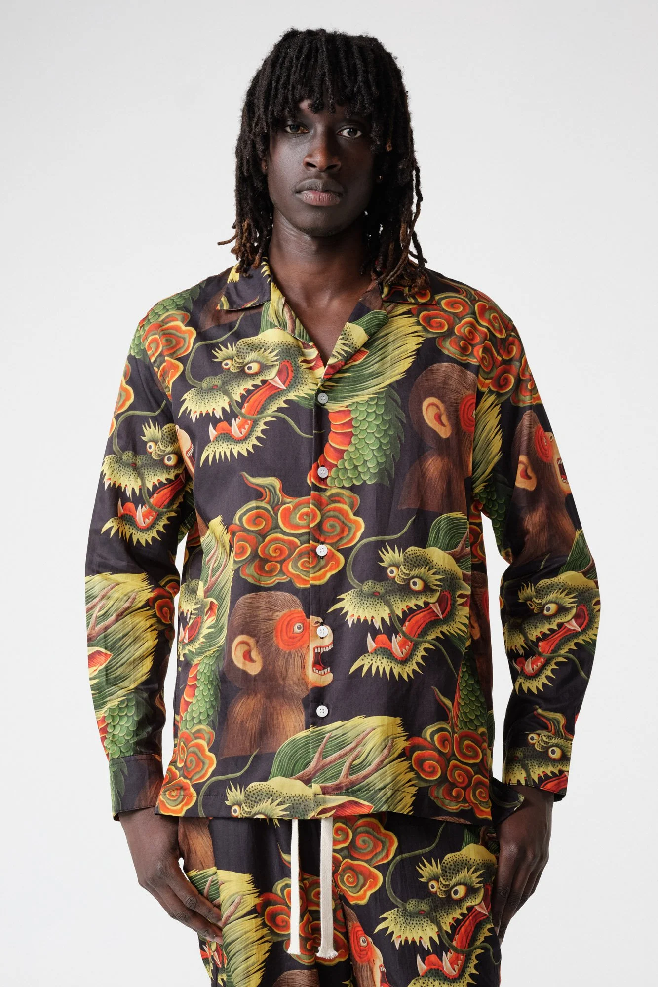 endless-joy-printed-monkey-dragon-black-silk-cotton-pyjama-set-front-close-up