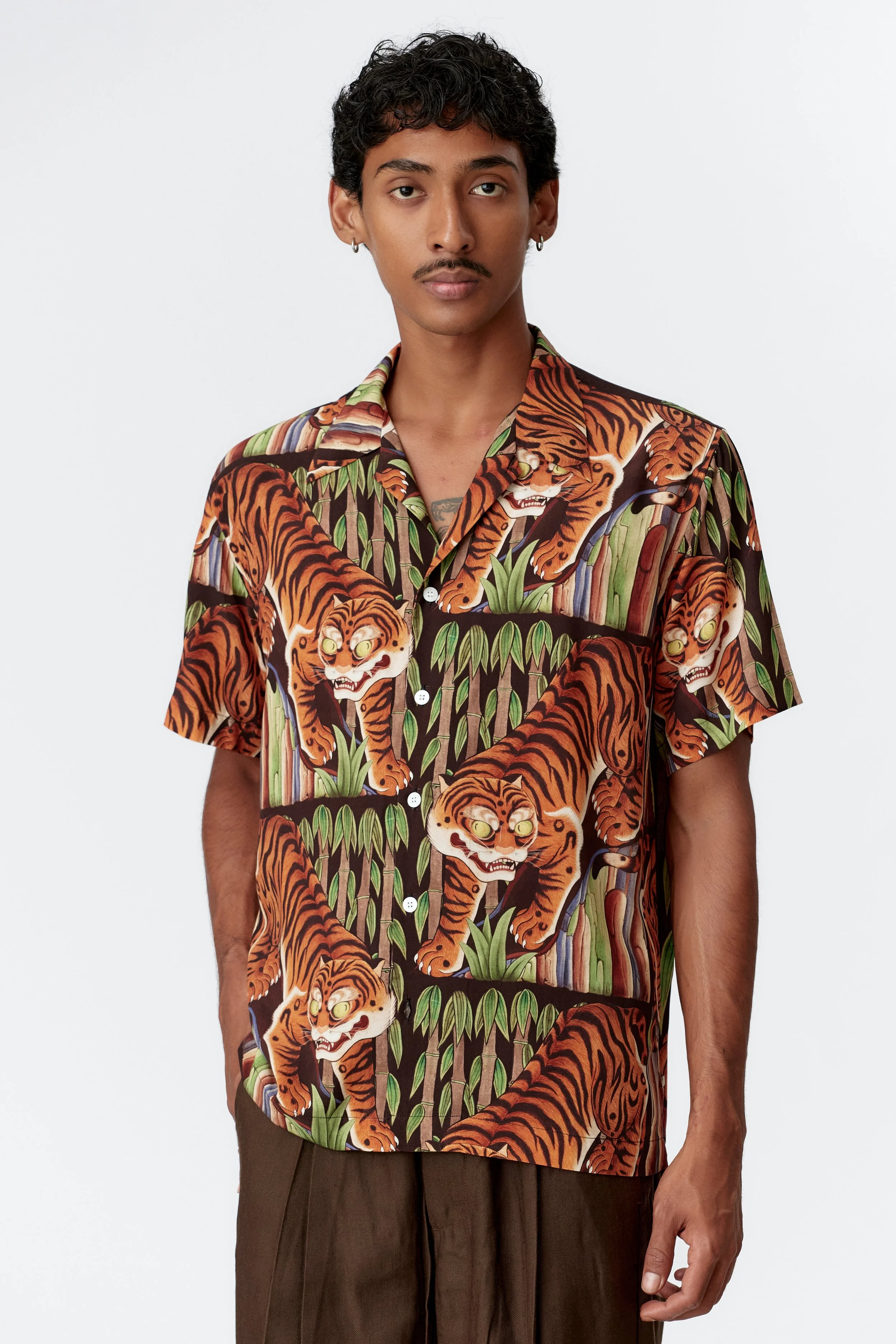 Three-quarter front view of Endless Joy Tiger camp collar shirt in 100% premium rayon