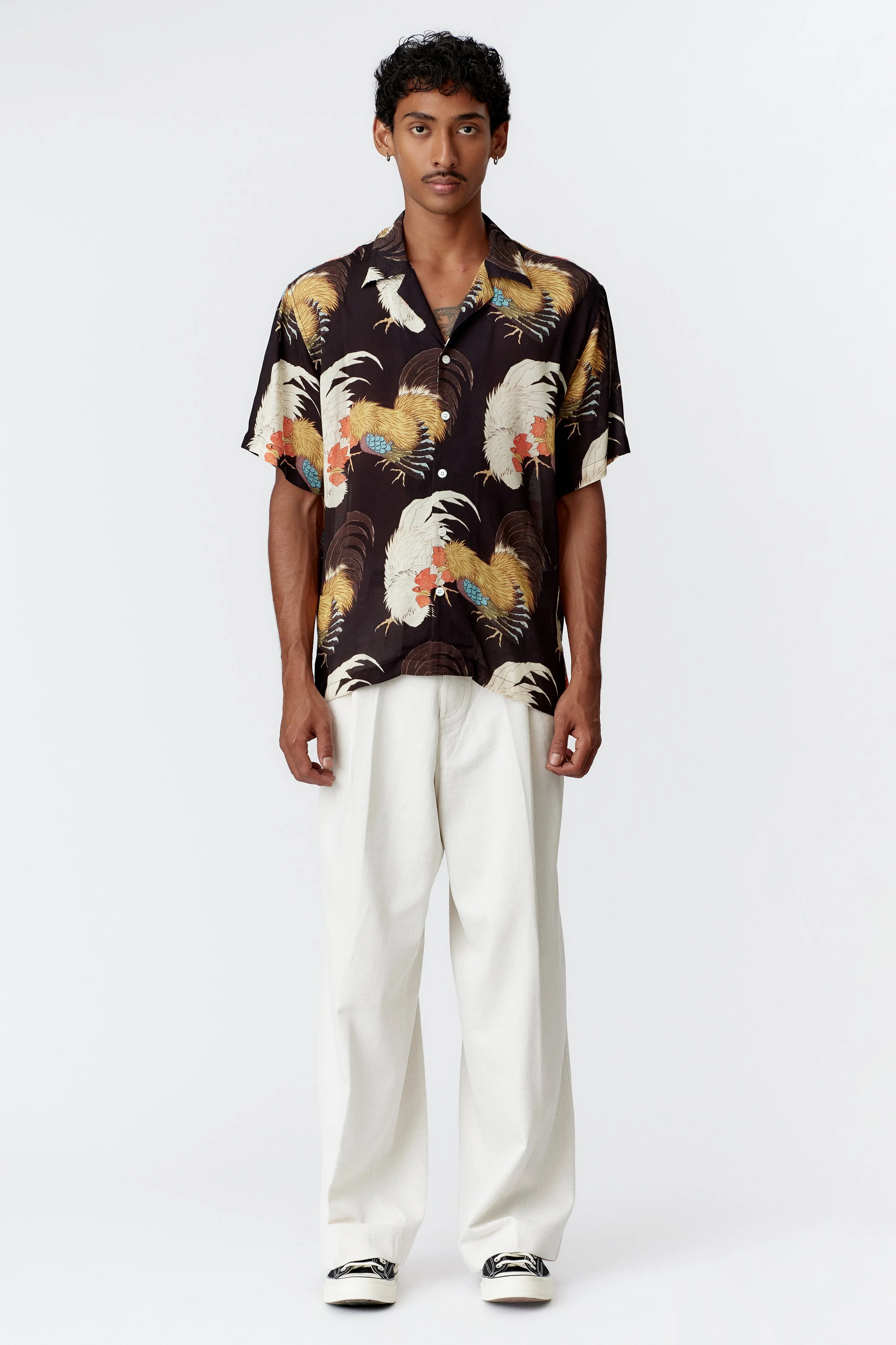 Full front view of Rooster black crepe rayon short sleeve shirt with bold clashing rooster artwork