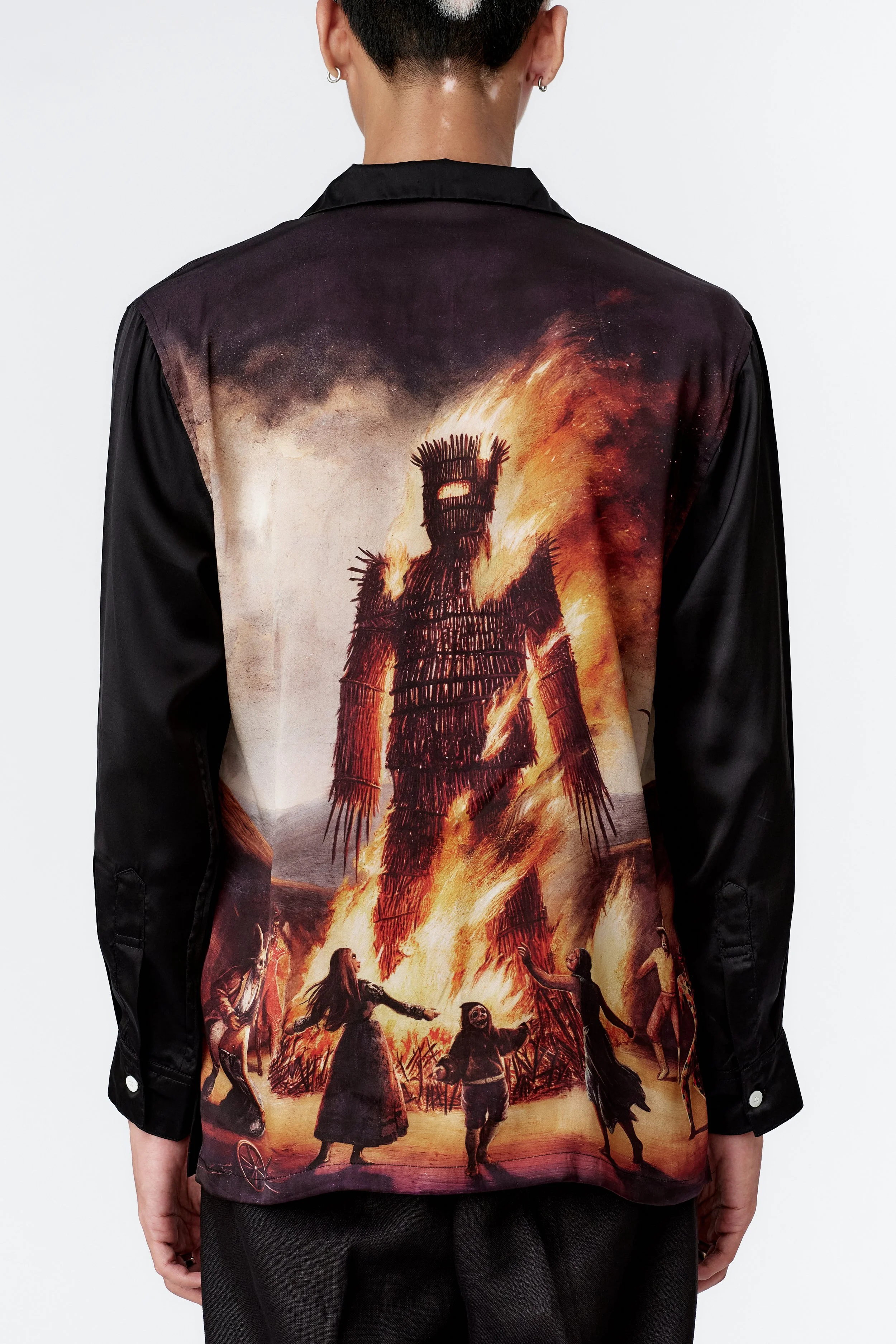 Close-up of Wickerman painting inspired by ritual myth and dark romanticism on silk satin