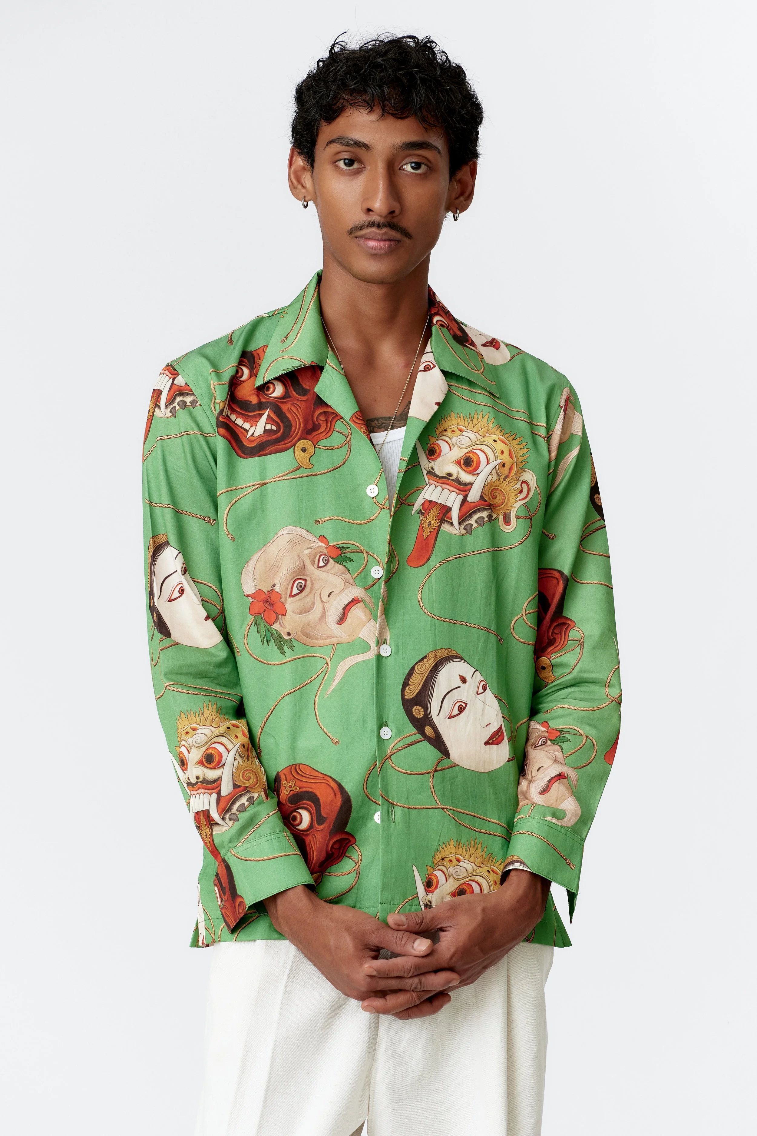 Close-up of Topeng mask portraits inspired by Balinese and Japanese traditions, illustrated by Stevie Anderson