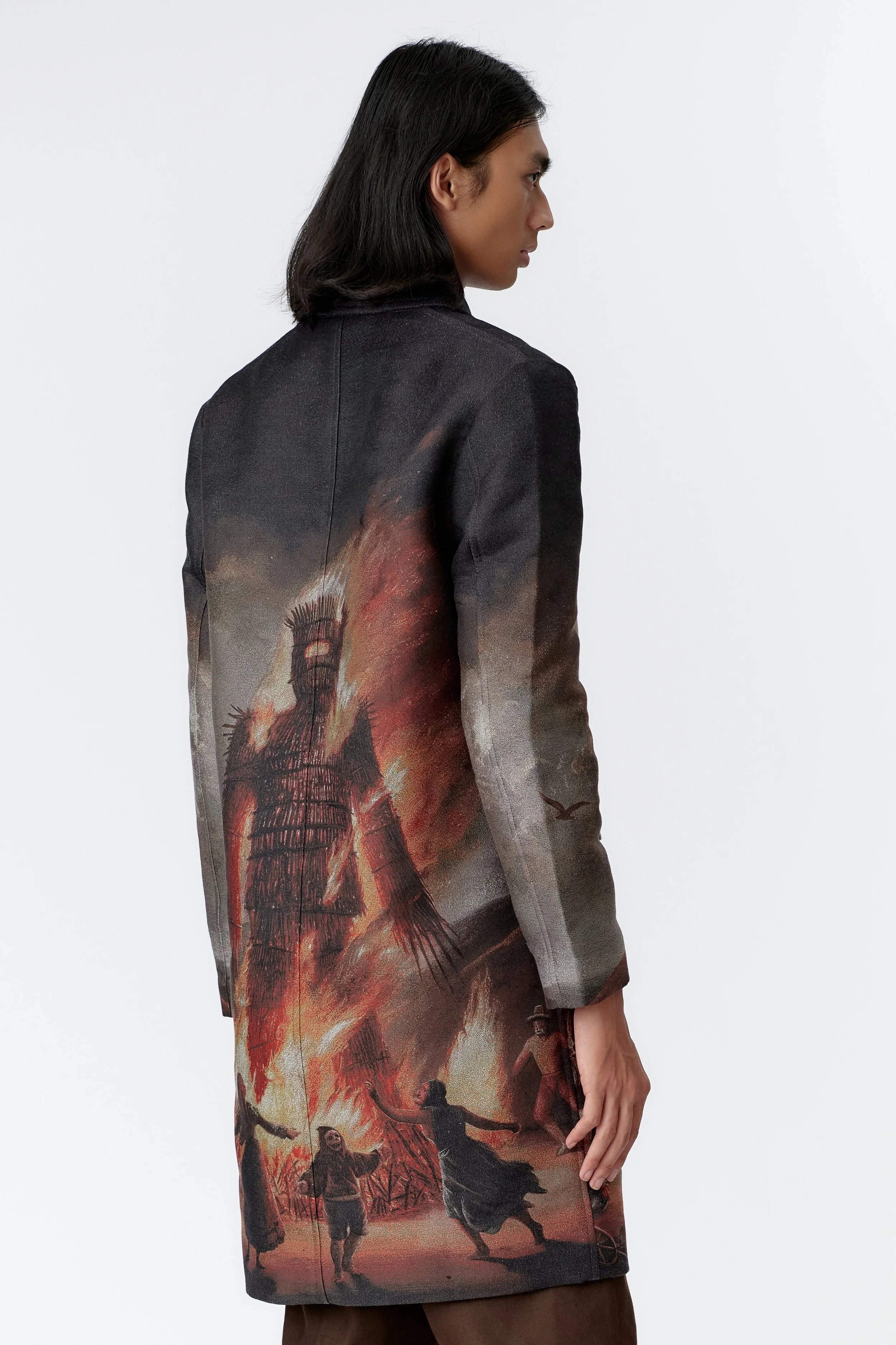 Rear close-up of Wickerman jacquard artwork on limited edition designer overcoat