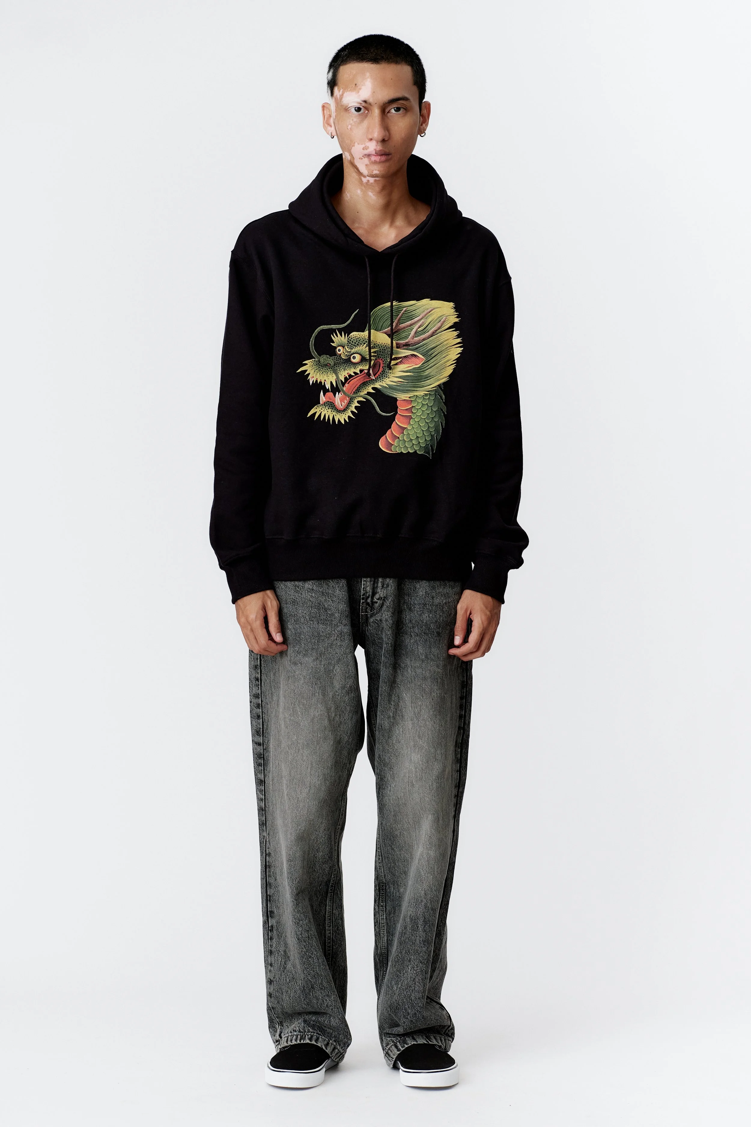 Full front view of Monkey Dragon black heavyweight organic cotton hoodie with bold dragon head print