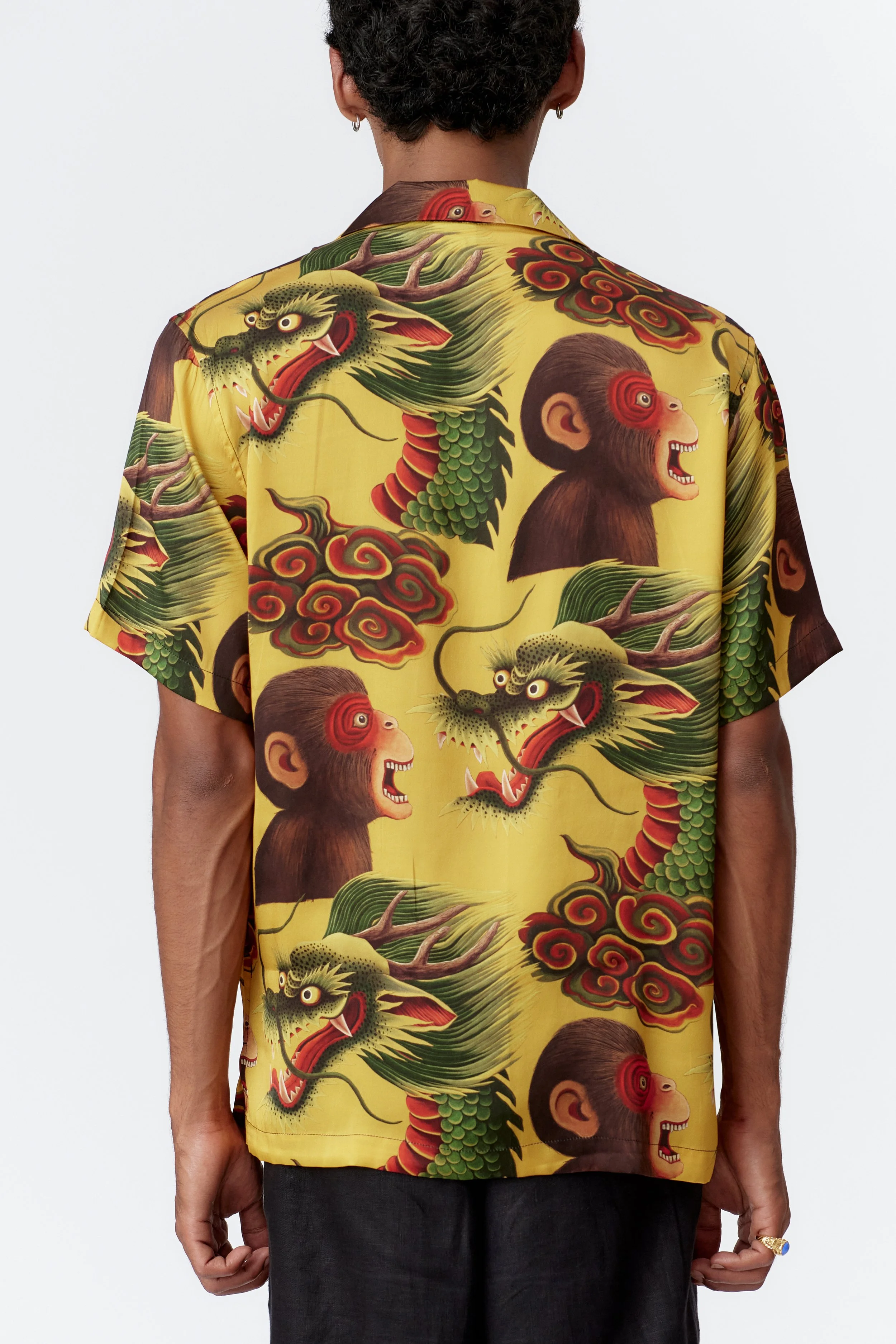 Back view of monkey dragon yellow silk satin shirt displaying full artwork placement.