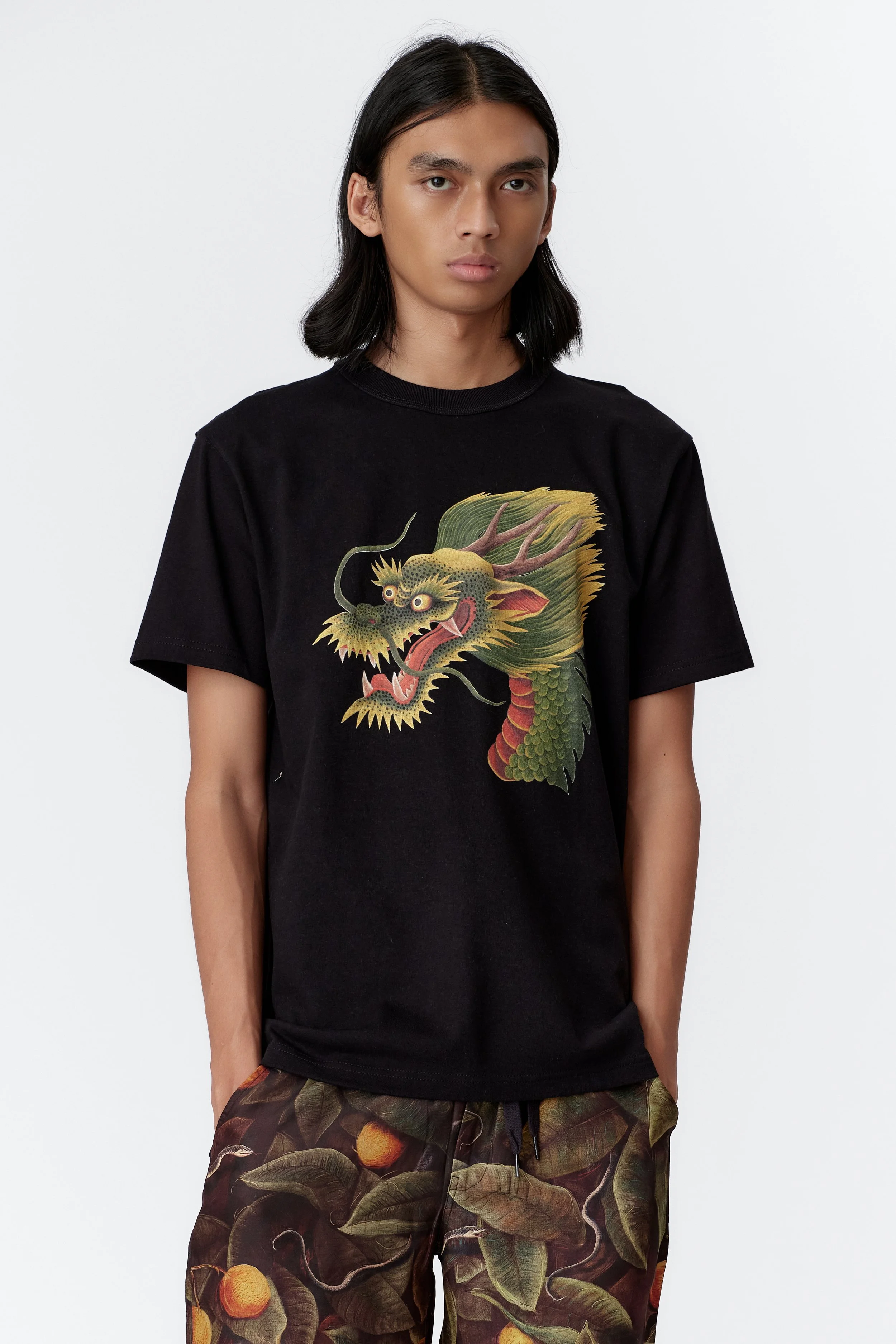front print and back print - this view is of dragon on front of heavyweight organic cotton black t-shirt