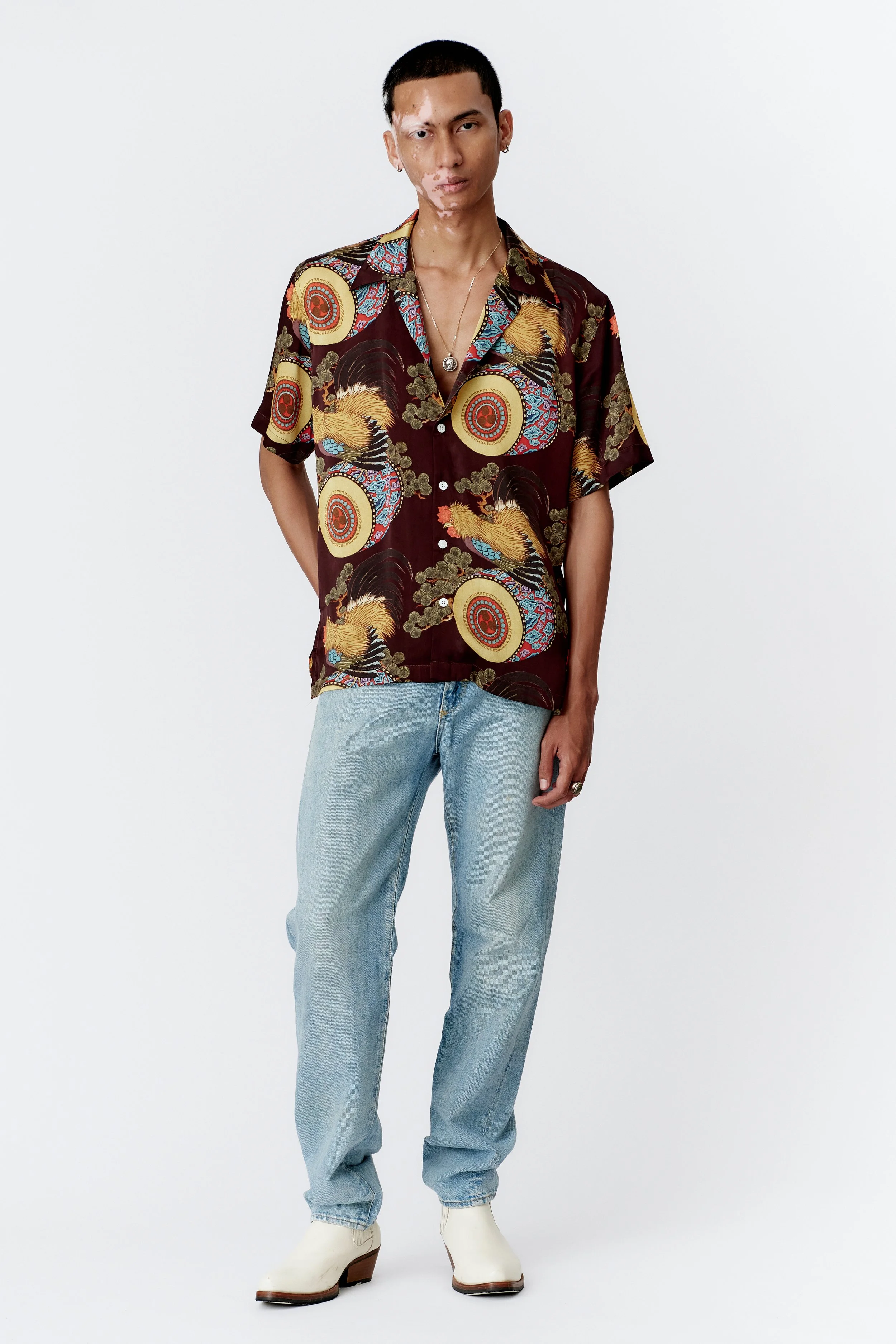 Full-length model shot in Rooster Drum Wine silk shirt showcasing relaxed fit.