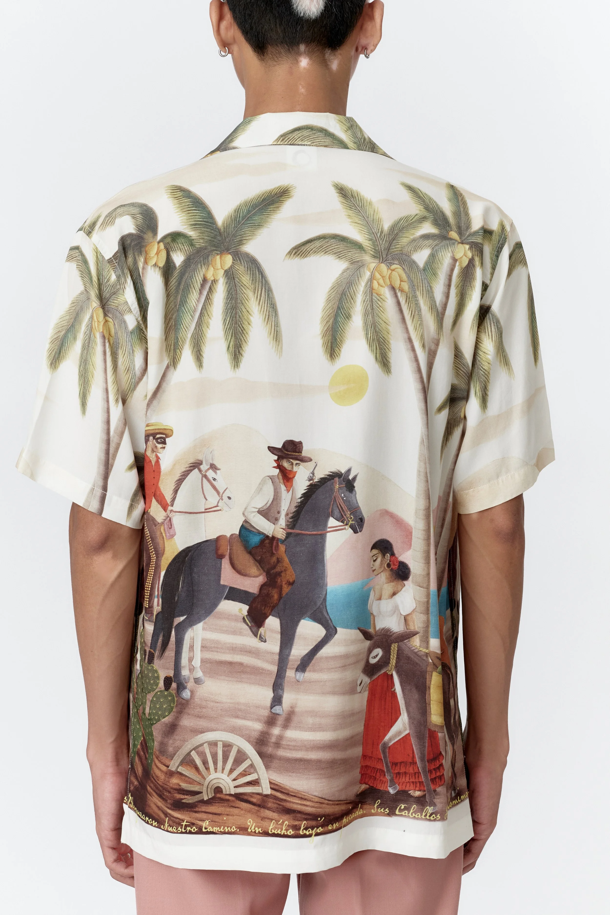 Back view of Bandito modal shirt showing palm trees beneath desert sky