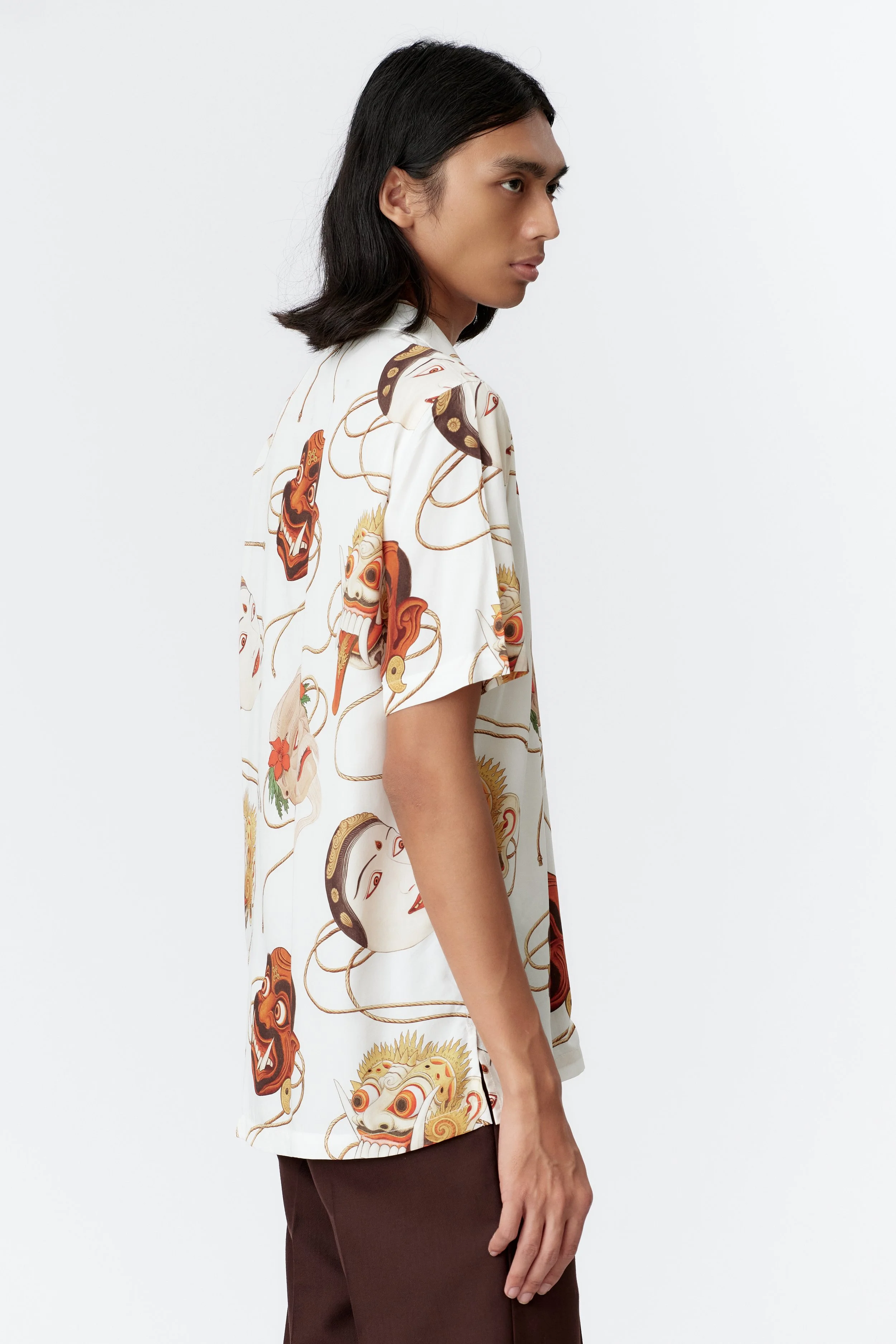 Rahain wearing Topeng White modal short sleeve shirt by Stevie Anderson