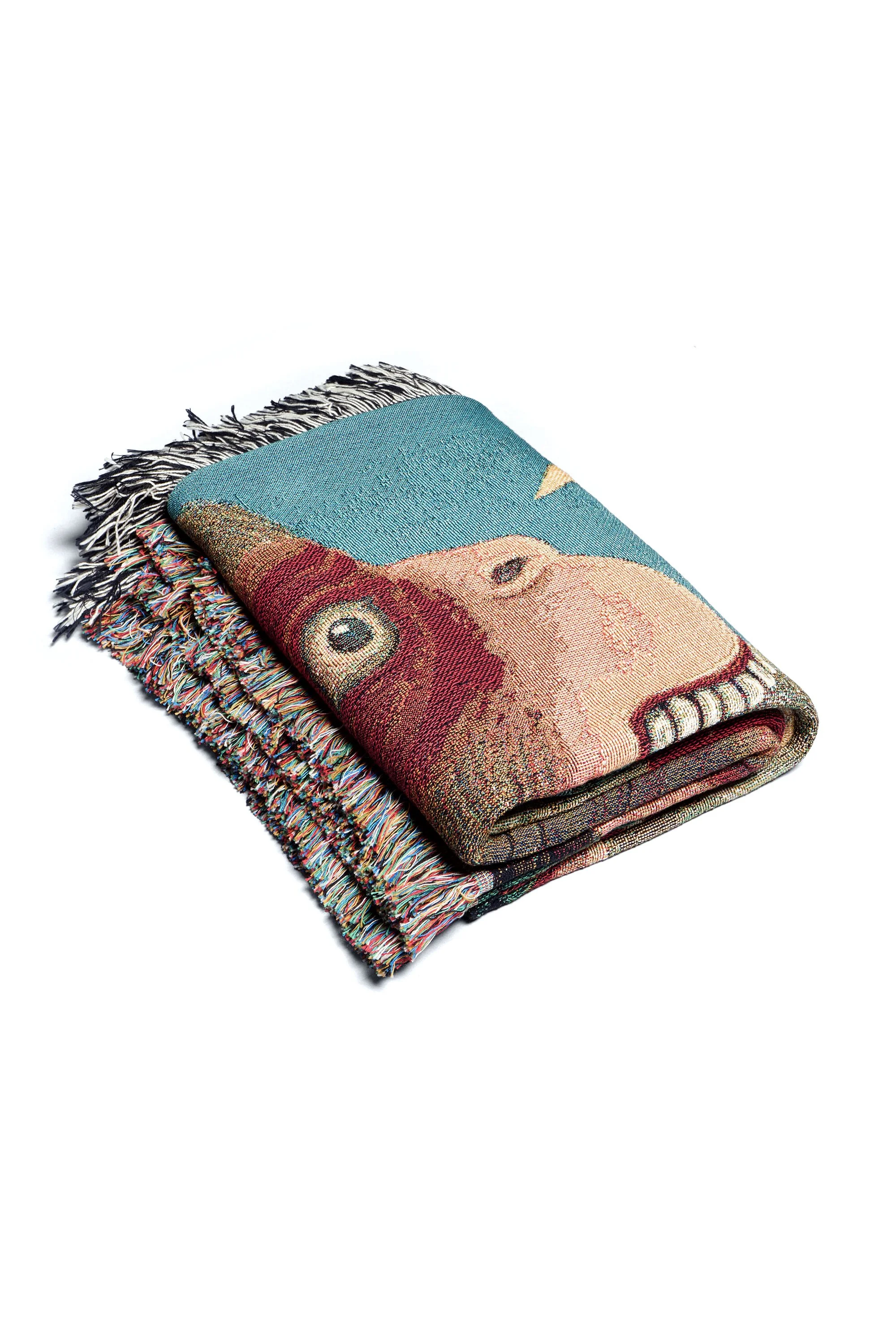 Monkey Dragon organic cotton woven art blanket folded view