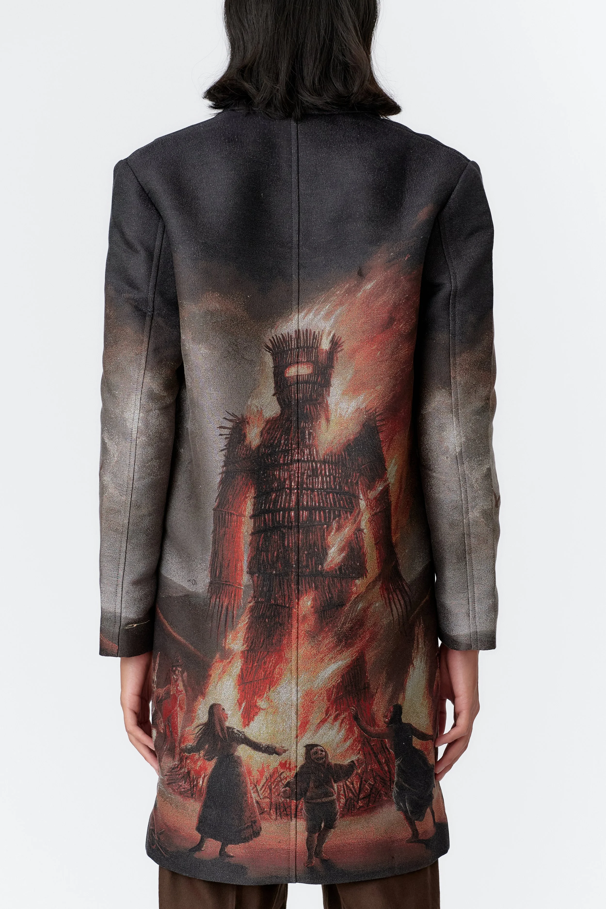 Back view of Wickerman artwork Jacquard Overcoat highlighting intricate woven imagery