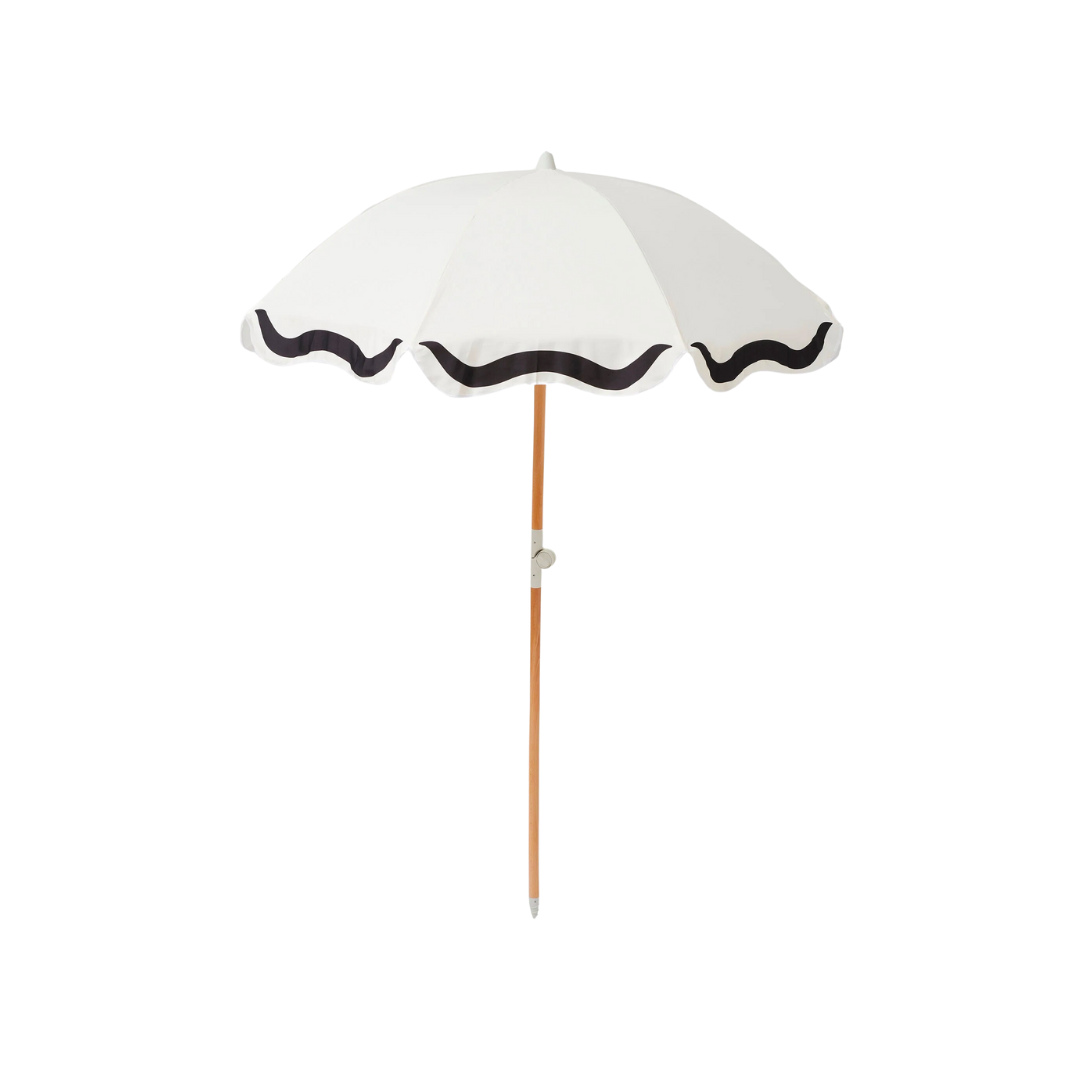 Rent white and black umbrella