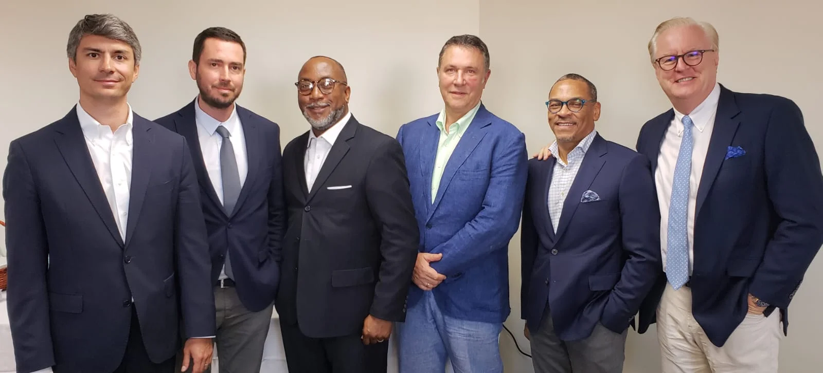 (From Left to Right) , Mr. Caner Cevdet Akcali - VP, Strategy and M&A , Mr. Ali Kosklu - Counsel & Office of the Chairman at Global Investment Holdings, Mr. Tasman Darling - Managing Partner at Blue Orchid Advertising, Mr. Mehmet Kutman - Chairman at Global Investments Holdings, Mr. Anthony Ferguson - President and Founder at CFAL , Mr. Colin Murphy - Head of Business Development, The Americas