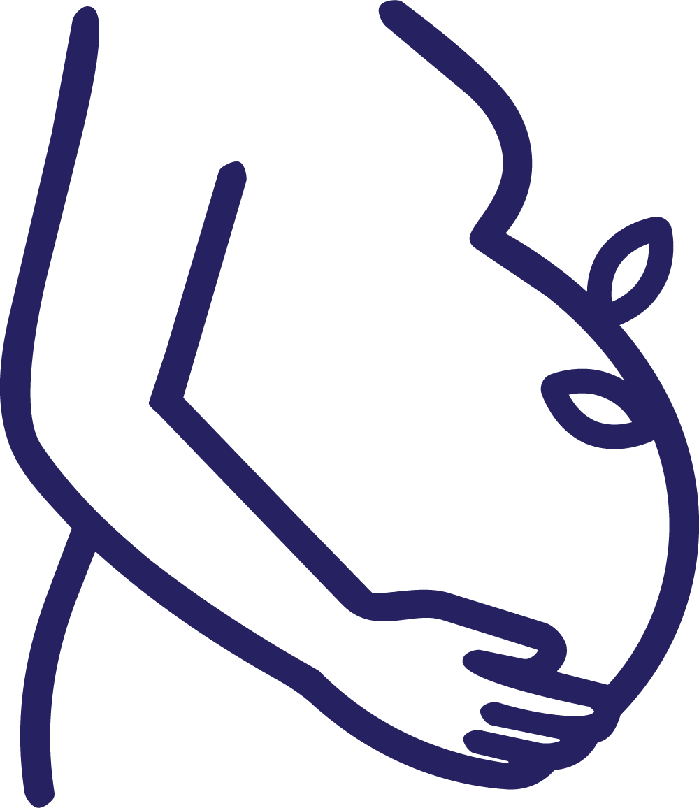 Close-up of a newborn baby lying in a hospital incubator, wearing a hospital wristband, with a focus on the baby's tiny hand and wrist.