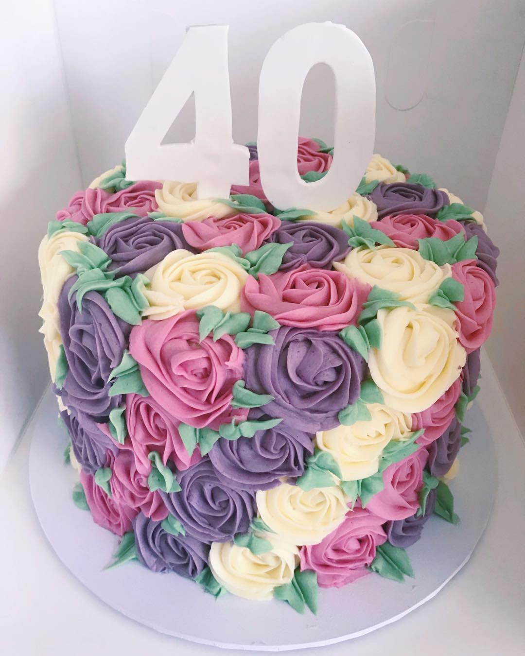 Double layered Pink Rose Swirl Buttercream Iced 8 inch Cake