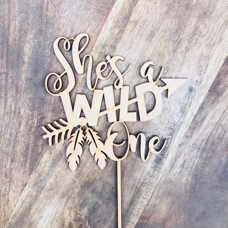 She's a wild on cake topper 