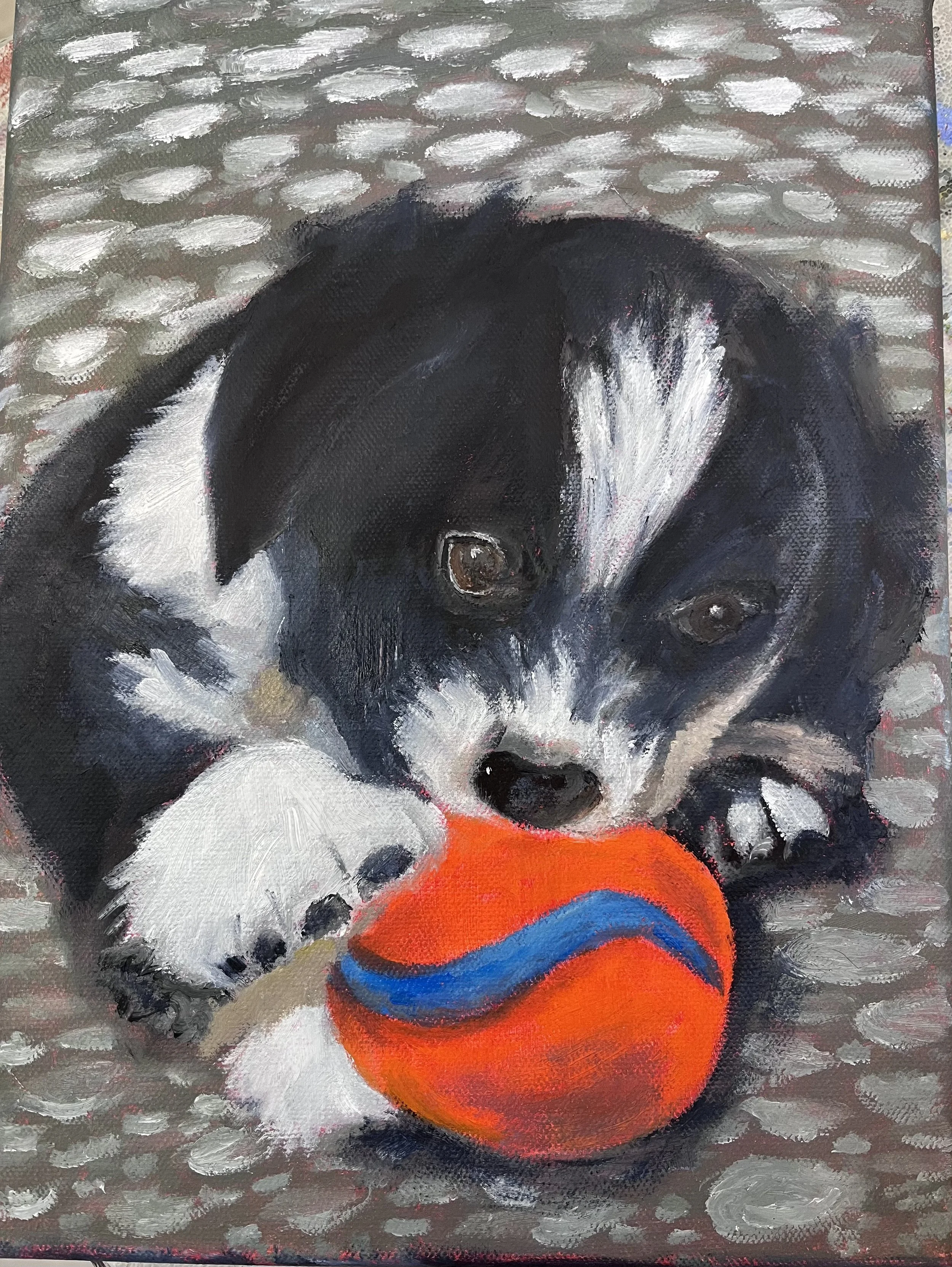 puppy with a ball.jpeg