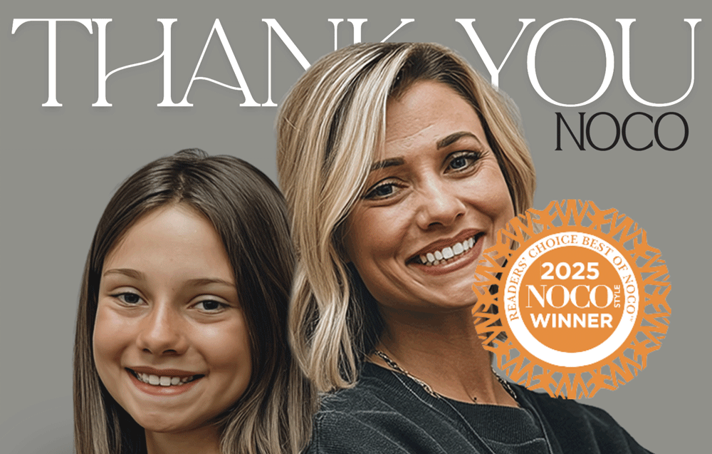 Woman with blonde hair smiling next to young girl with brown hair, both facing the camera against a gray background with the text "THANK YOU NOCO," and a badge that says "2025 NOCO WINNER."