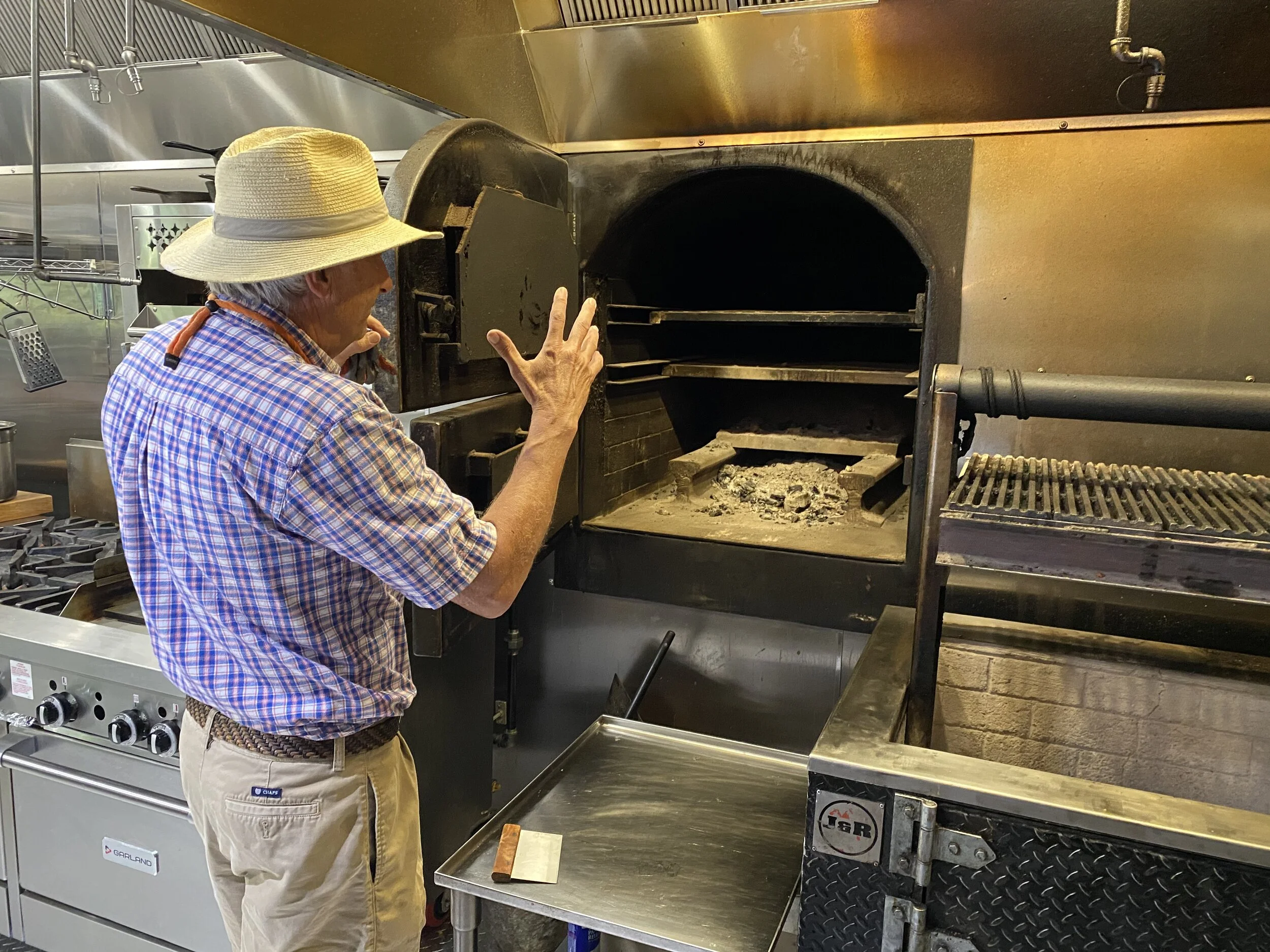 Starr with the Campfire Grill wood-fired oven.