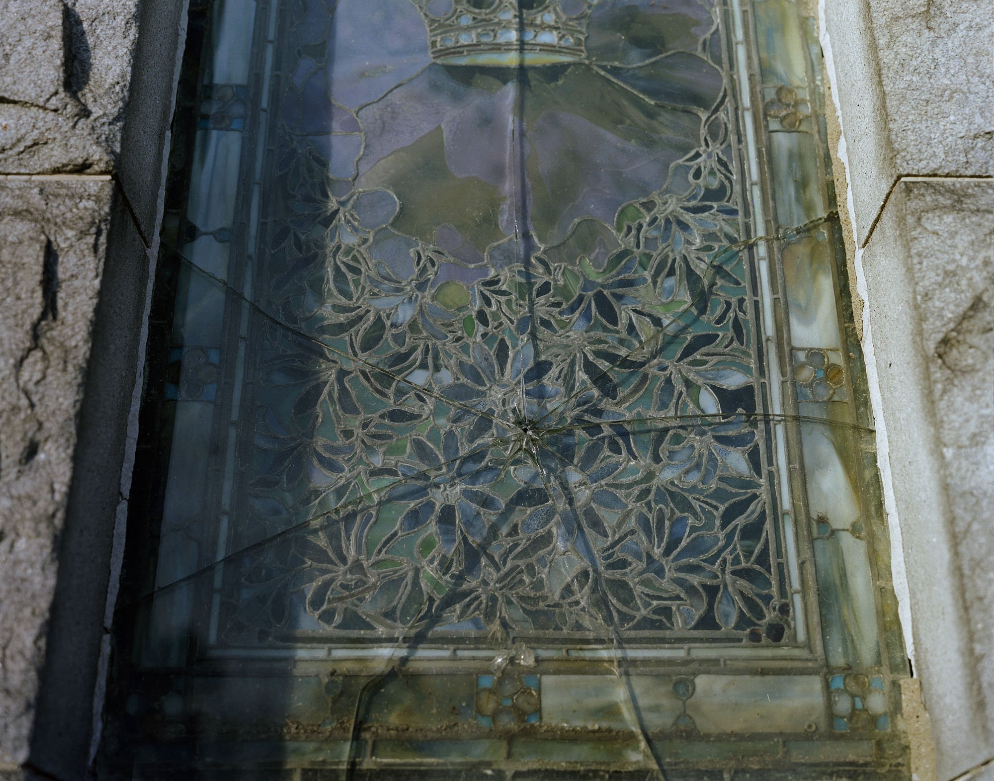 GreenWood-brokenwindow1.jpeg