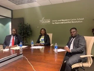 The NCIC delegates in Founders’ Hall. From L to R: Commissioner Sam Kona, Vice-Chair Wambui Nyutu and Commissioner Dr. Danvas Makori