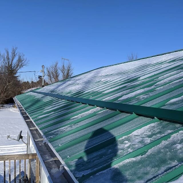 Following our summer installation of this steel roof the client decided it was time to add on some ice guards. Considering our recent weather it's easy to see why. These aluminum blocks help to prevent those large sheets of snow from falling off of y