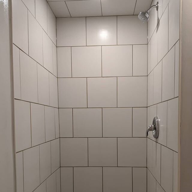 We gave this walk in shower a water tight remodel and some modern updating. After rebuilding the dim, mouldy existing shower we gave it a clean white tile look, mosaic floor, an added pot light, and a marble entry step. For your next project from bas