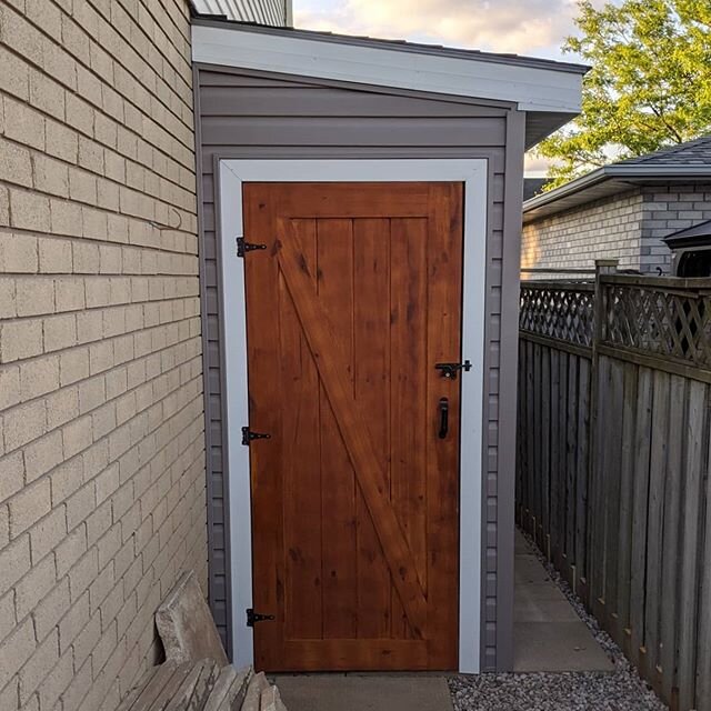 A custom built shed like this could be the perfect space saver for your backyard. Completed with hand stained doors, vinyl siding and aluminum capping. For projects like this, any interior work, or anything inbetween call Classic Home Improvements to