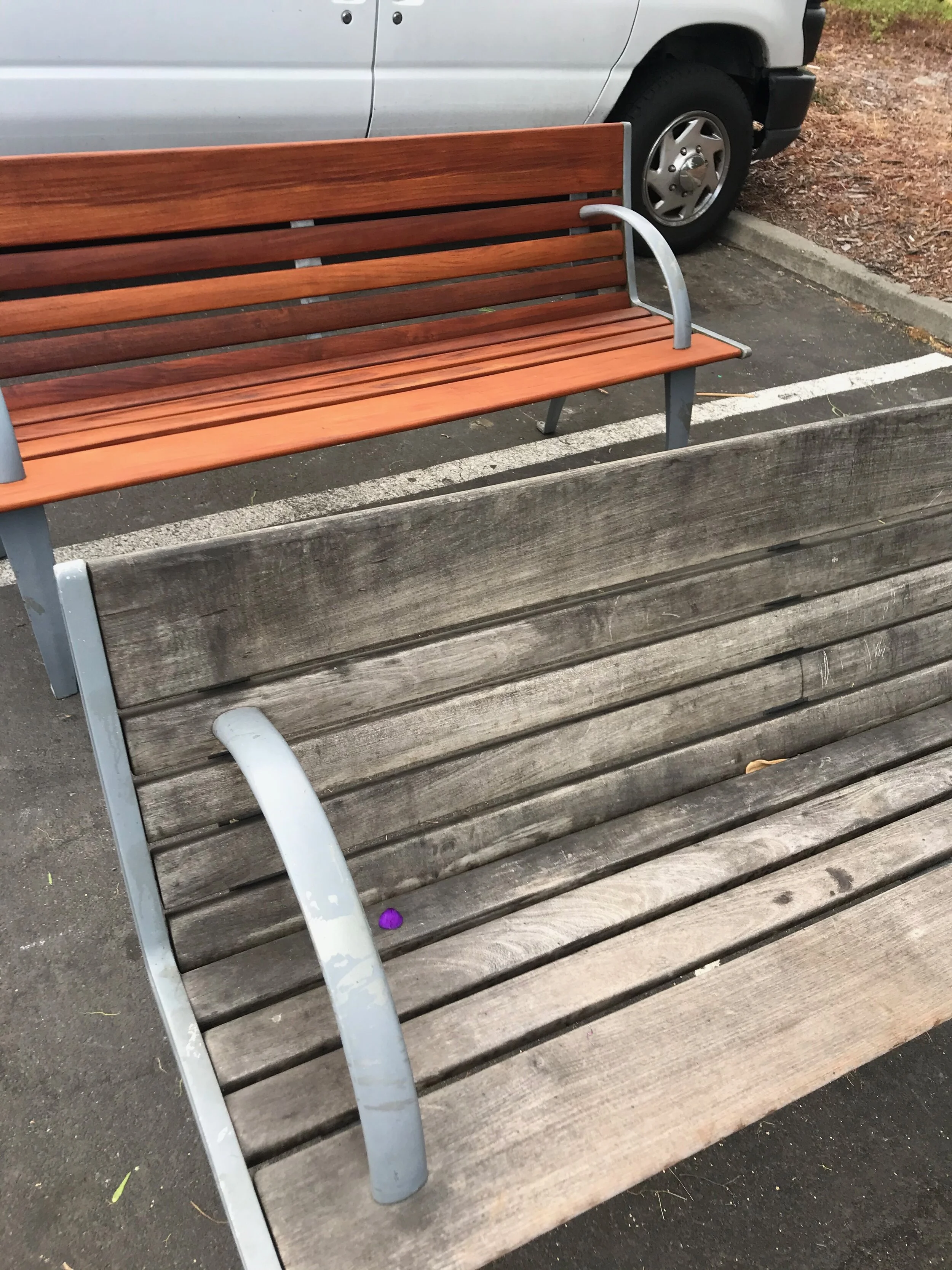 Newly refinished  outdoor bench and an old one together