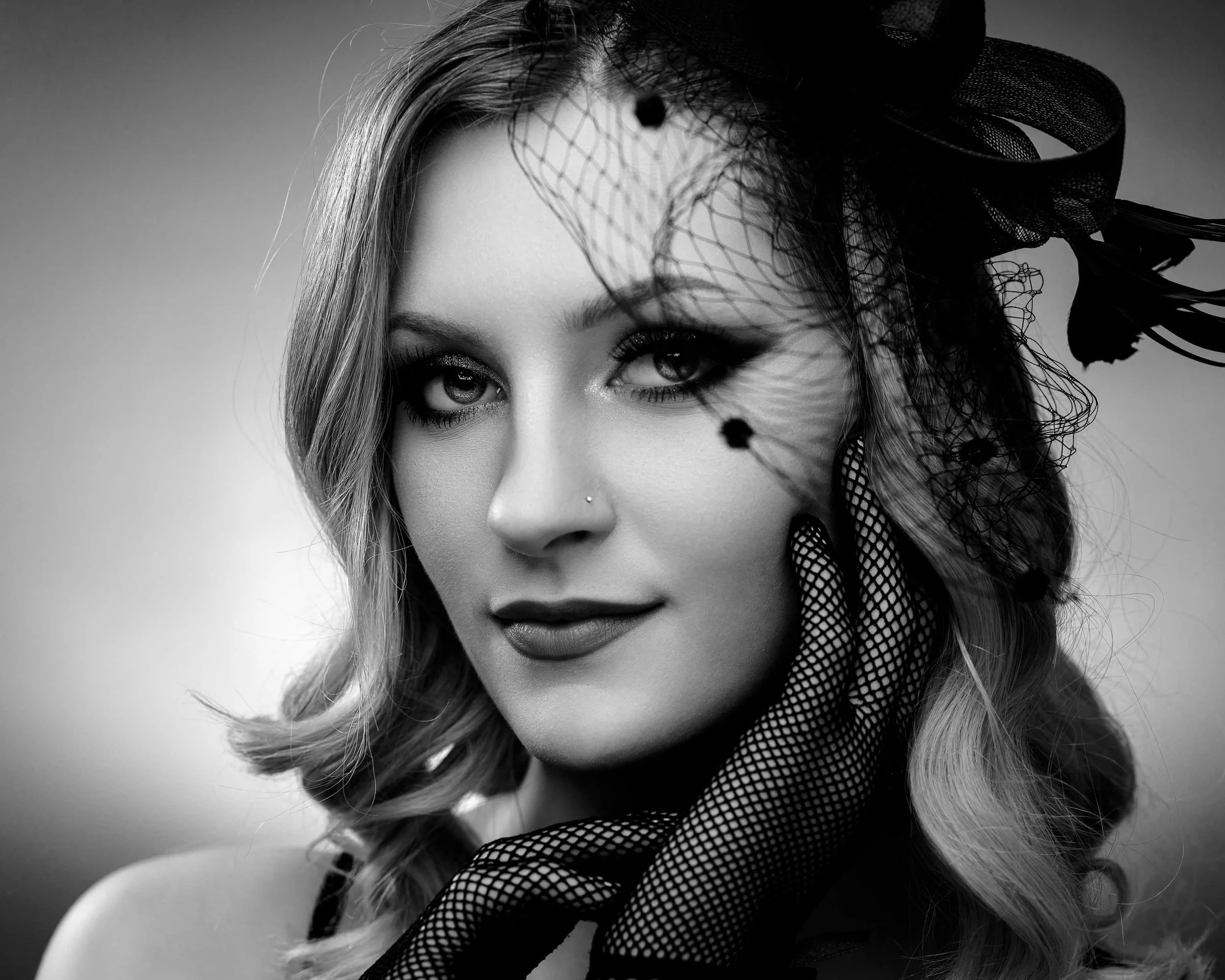 Creative black and white editorial portrait photography in Northern Indiana featuring a vintage veil.