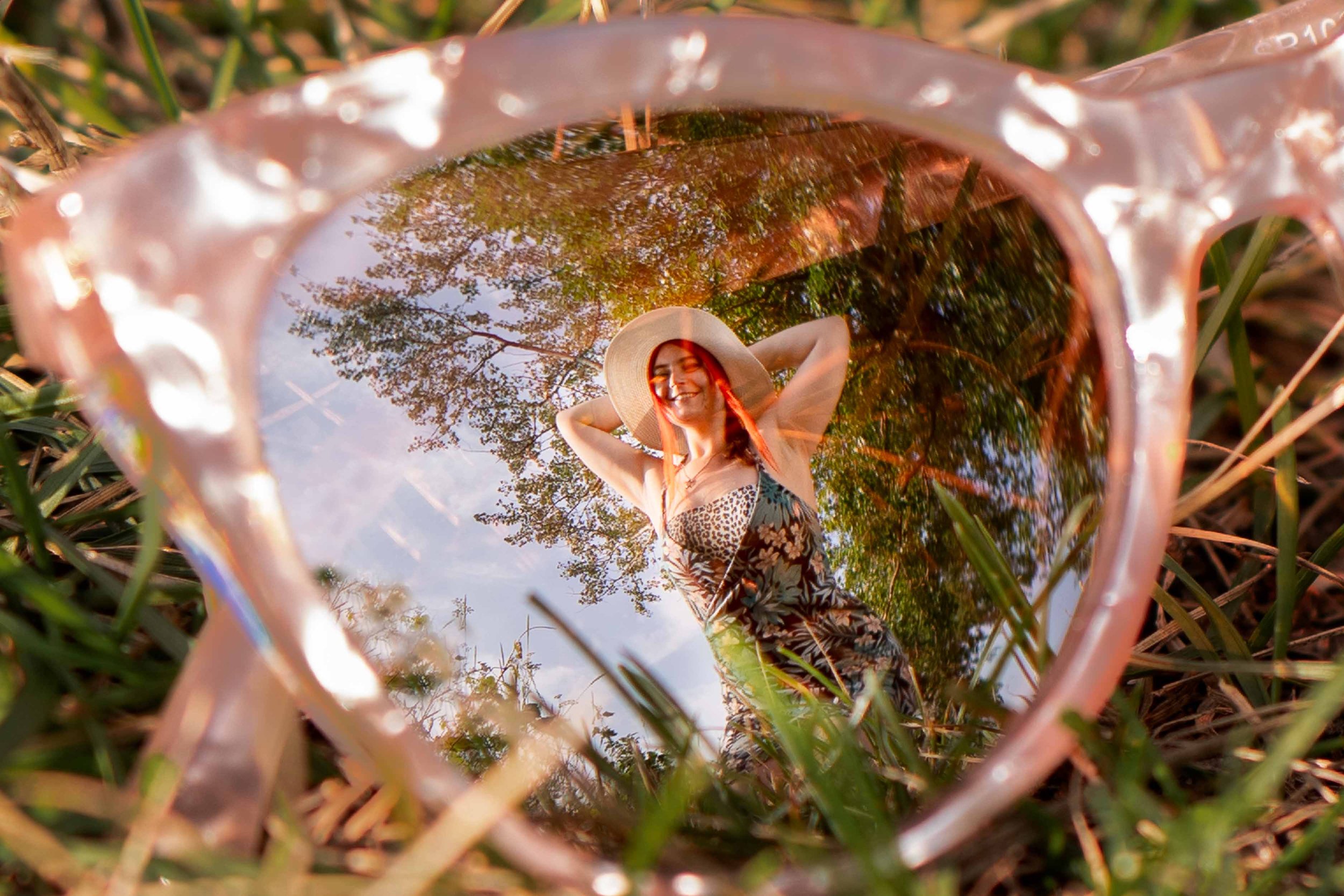 Creative portrait photography in South Bend featuring a unique reflection in sunglasses for a fashion-forward Northern Indiana session.