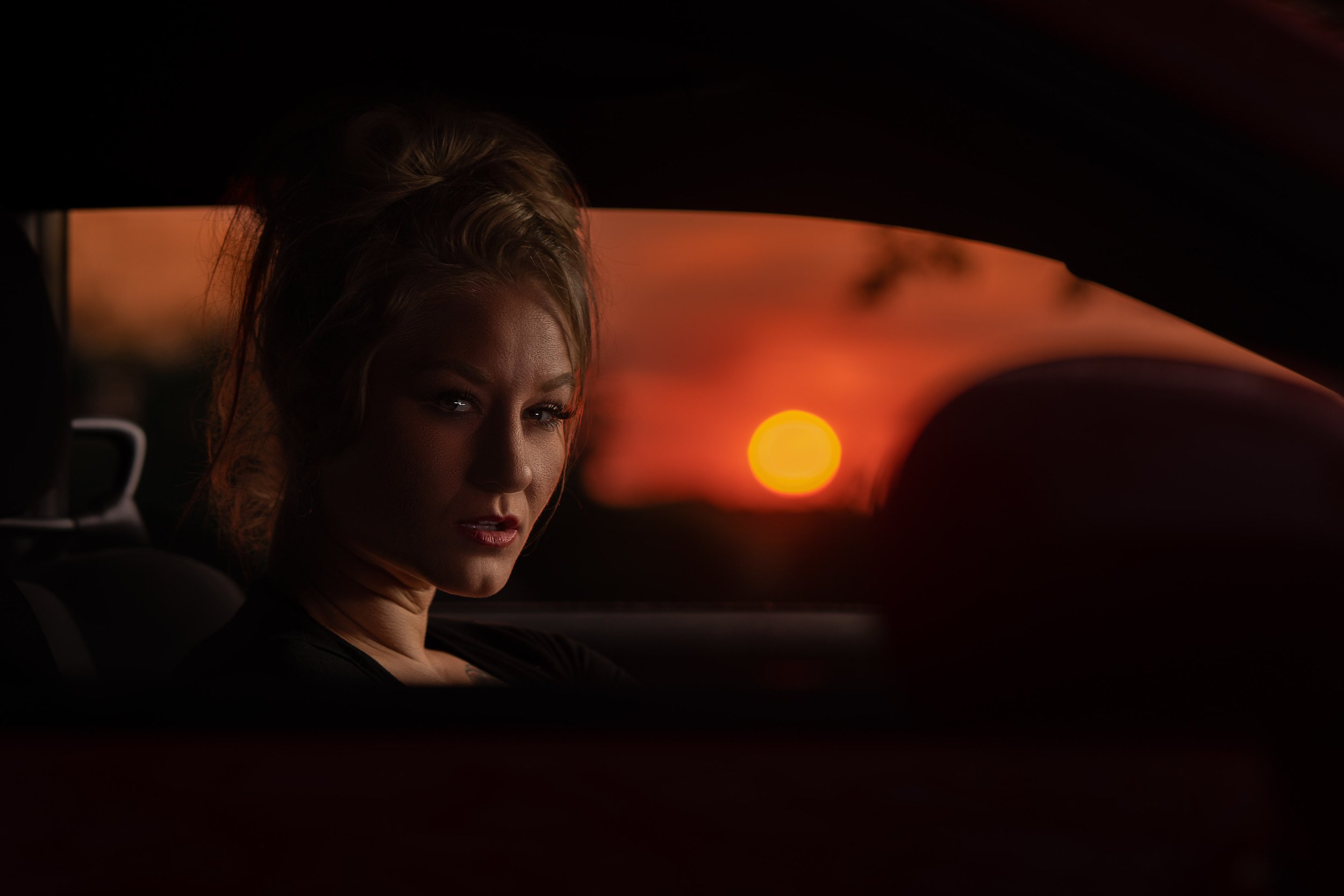 Cinematic sunset car portrait by a Southern Michigan photographer specializing in dramatic lighting and editorial style.