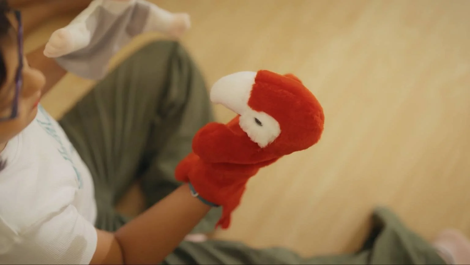 Child's emotional expression through puppets at Play Therapy with Anya