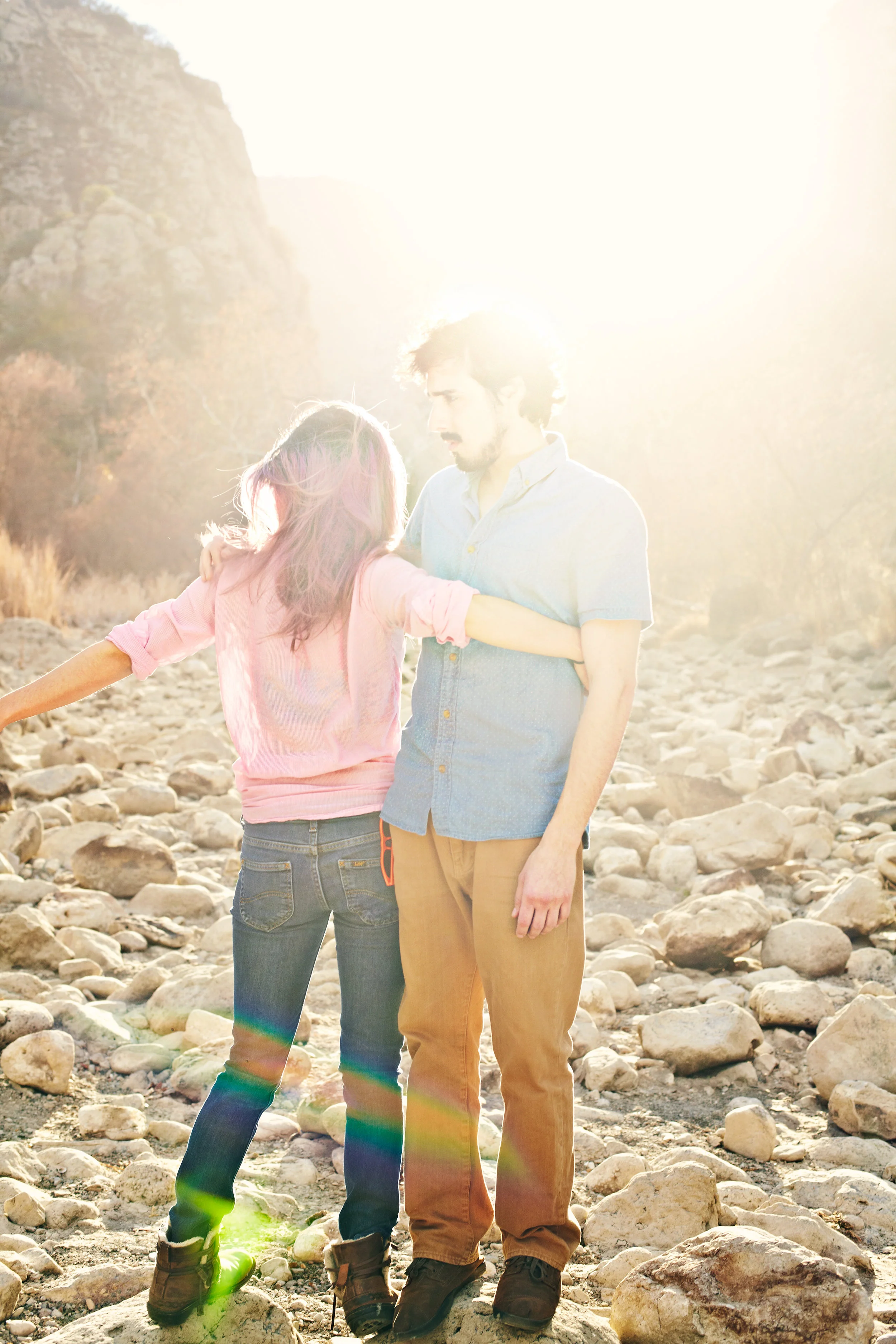 Young couple embracing in the sunset