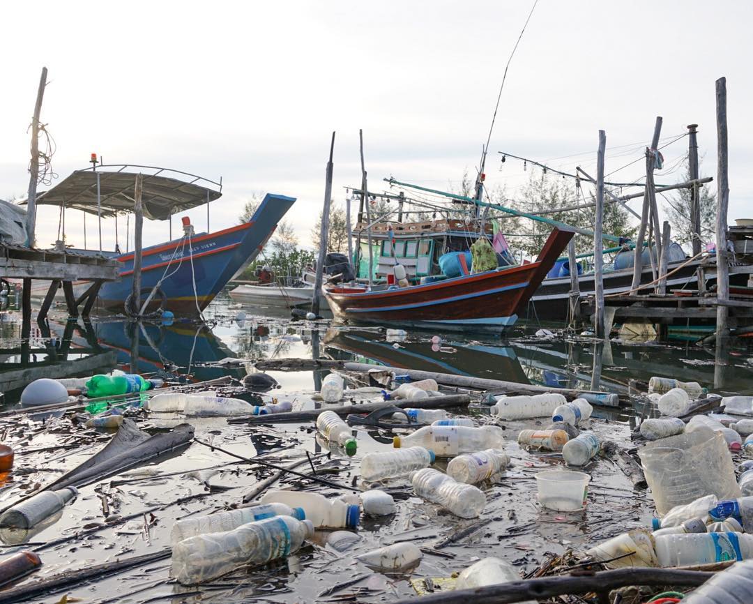  Fishing boats in a sea of plastic. Image:  Fran Cresswell  