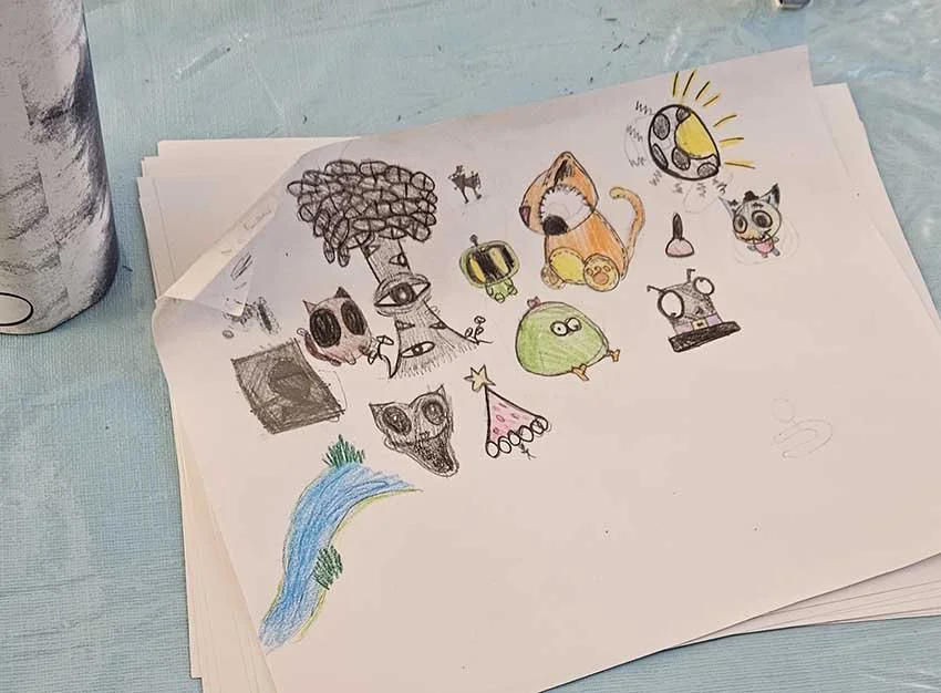 A wonderful page of imaginative doodles drawn by a Cartoon Camp student!