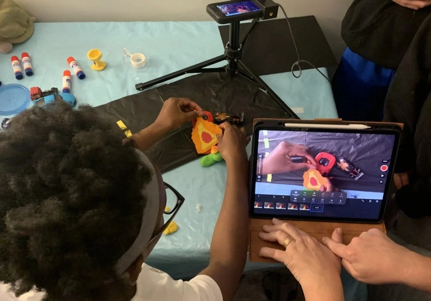 Stop-Motion Animators hard at work, animating a film at Upchuckle Education's Cartoon Camp in Barrie, ON