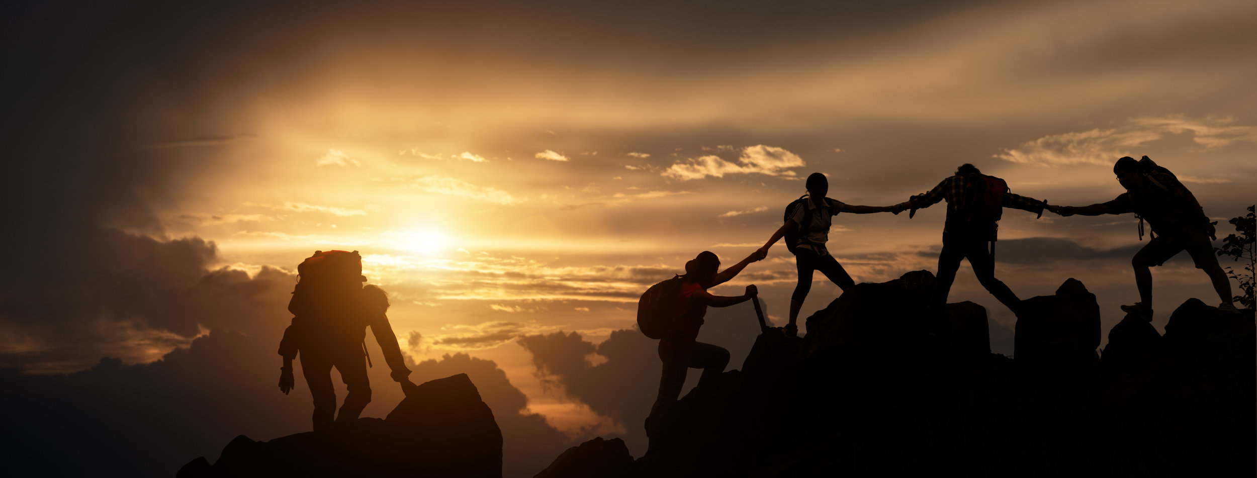 Group of people climbing.jpeg