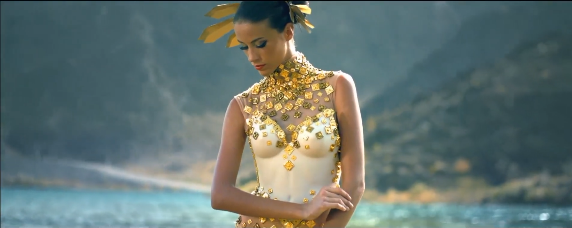 A coastal fashion scene with gold detailing from Rene Auguste's DP reel