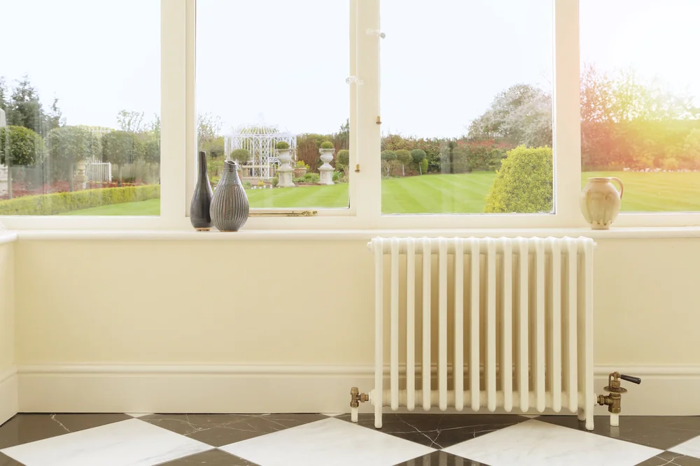 Antique Cast Iron Radiators In a Period Hall — Vintage Cast Iron Radiators