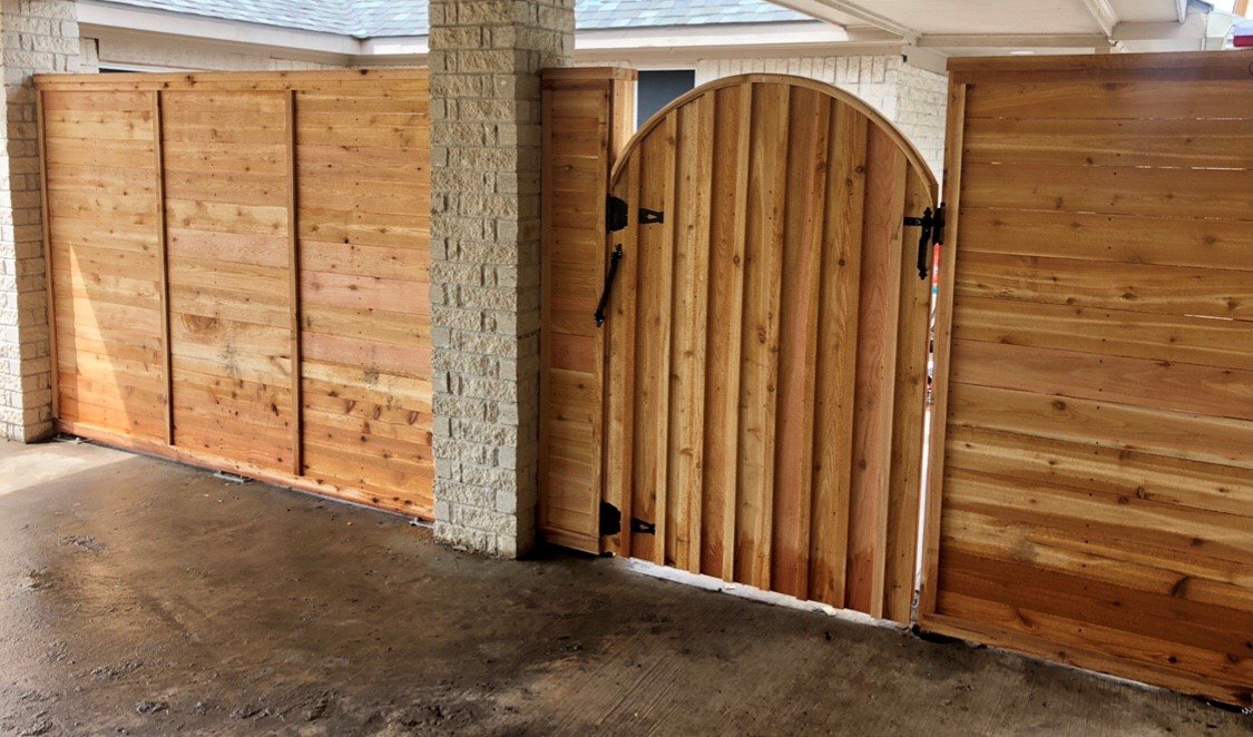 Custom cedar privacy fence with arched gate.jpg