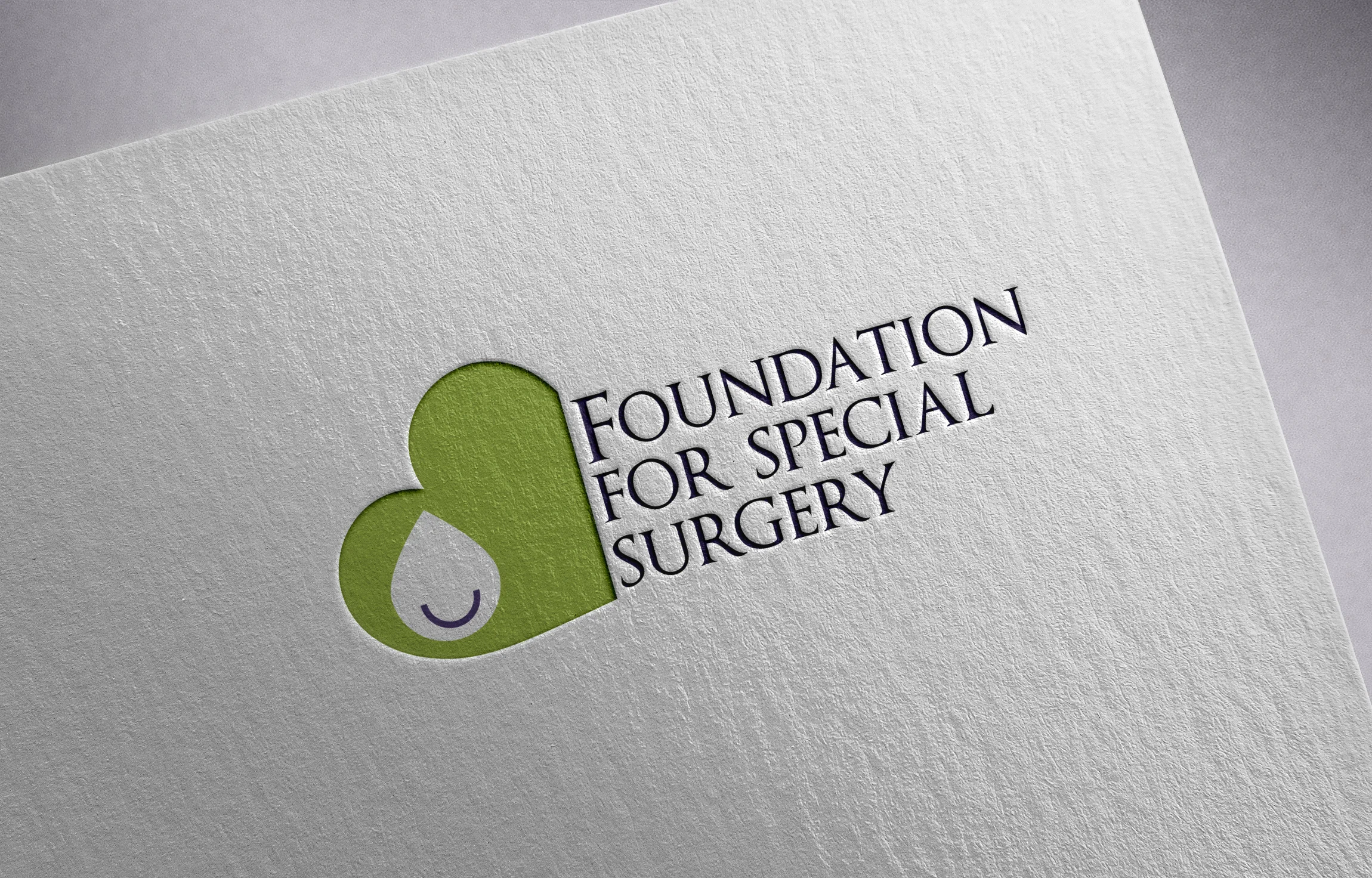 Free Logo Mockup PSD on Textured paper.jpg