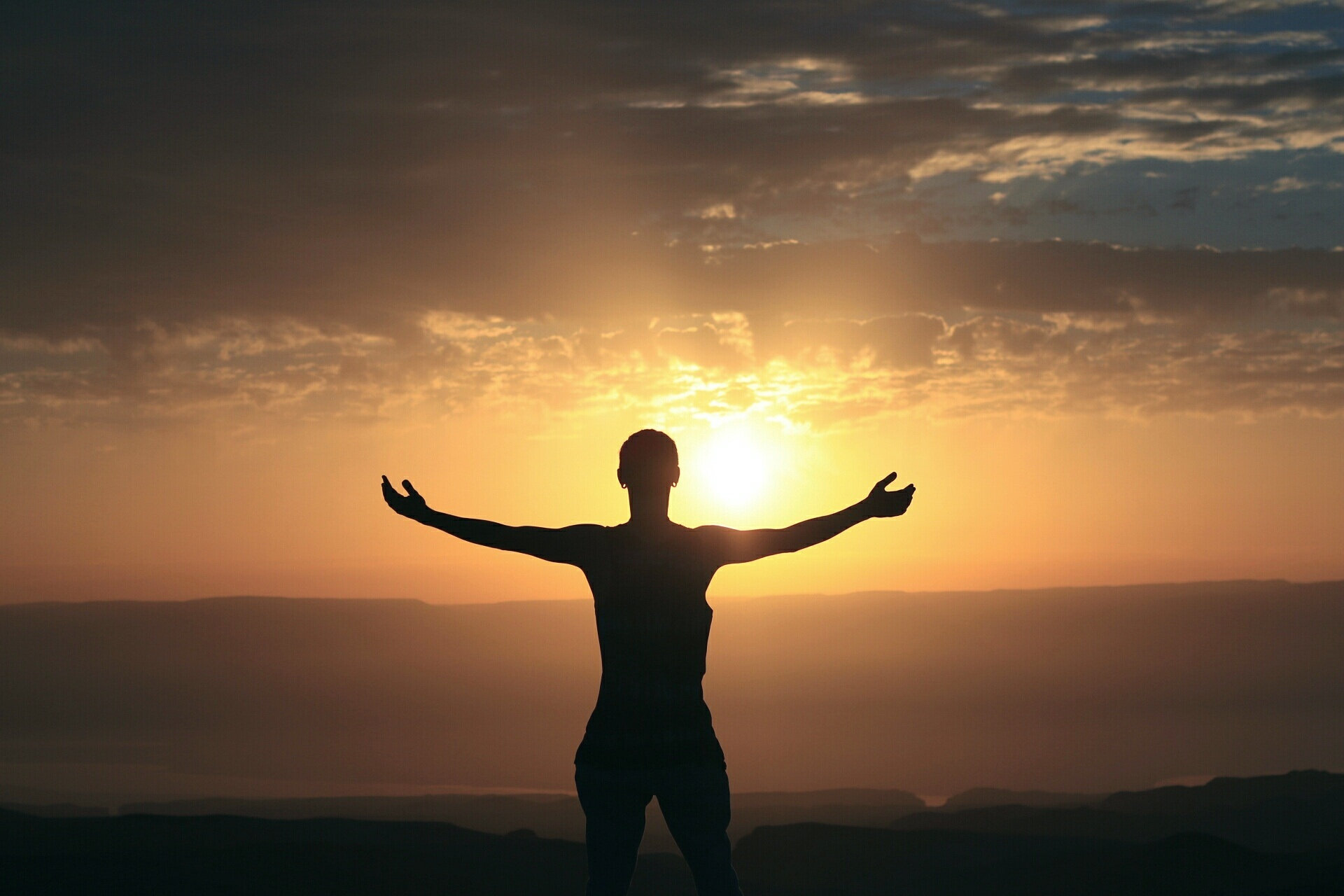 Canva - Silhouette Photography of Person Spreading Arms.jpg