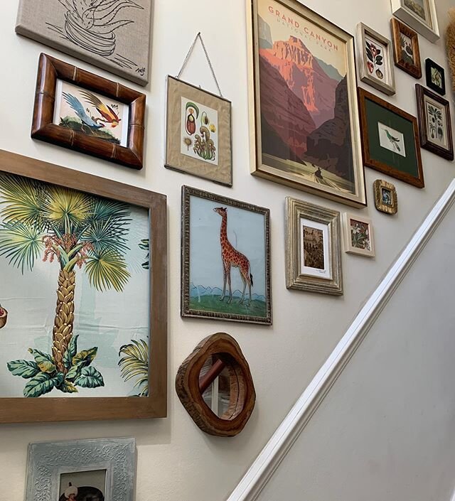 Finding joy in arranging some different frames, art cards and fabric pieces for the wall.  #rearranging #staircasedecor #rearranging art #clearing out stuff #styling # home decor  #belongings #artcards
