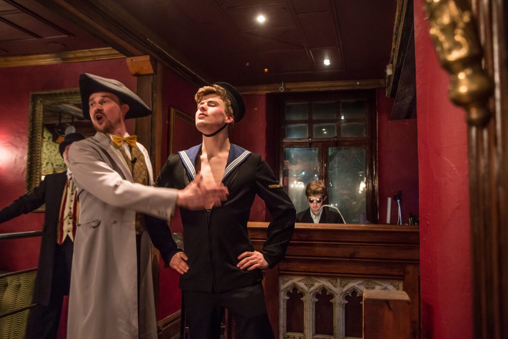 JOEL PARRY AS GORTON, RYAN FRANCIS AS WHITEHEAD AND DAN CHAPPELL AS THE MUSICIAN (LEFT TO RIGHT)