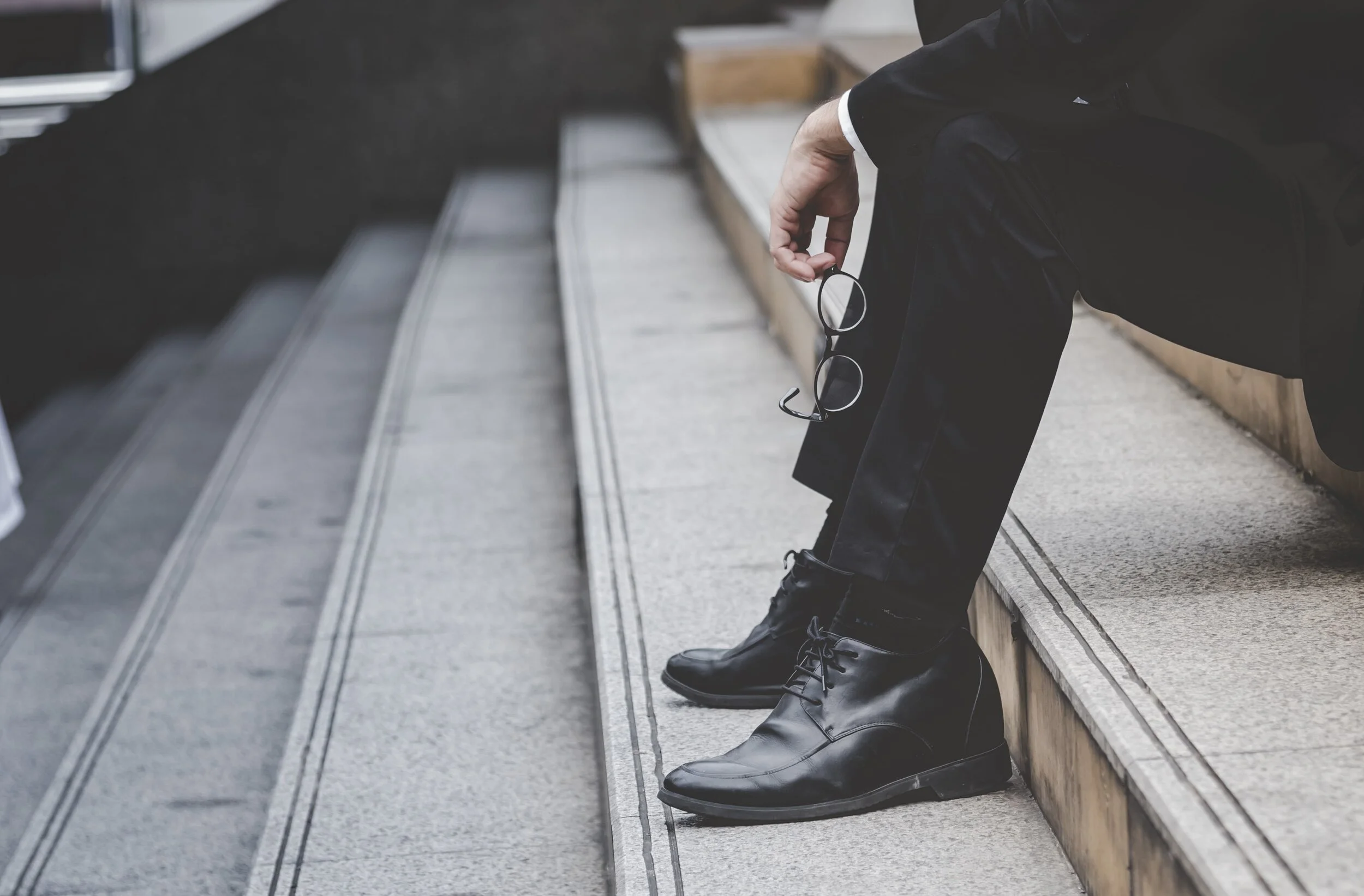 Depressed man-stairsglasses -min.jpeg