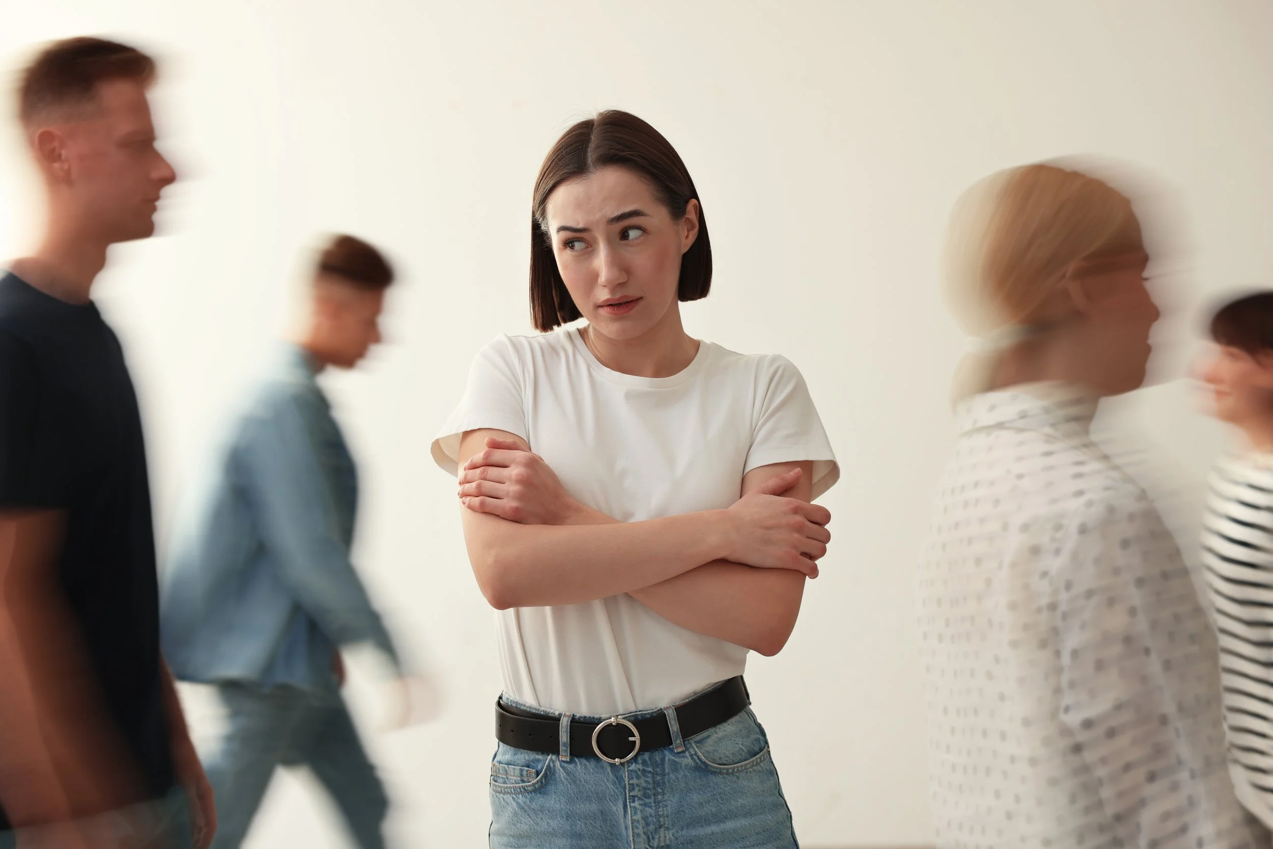 anxious woman with folded arms