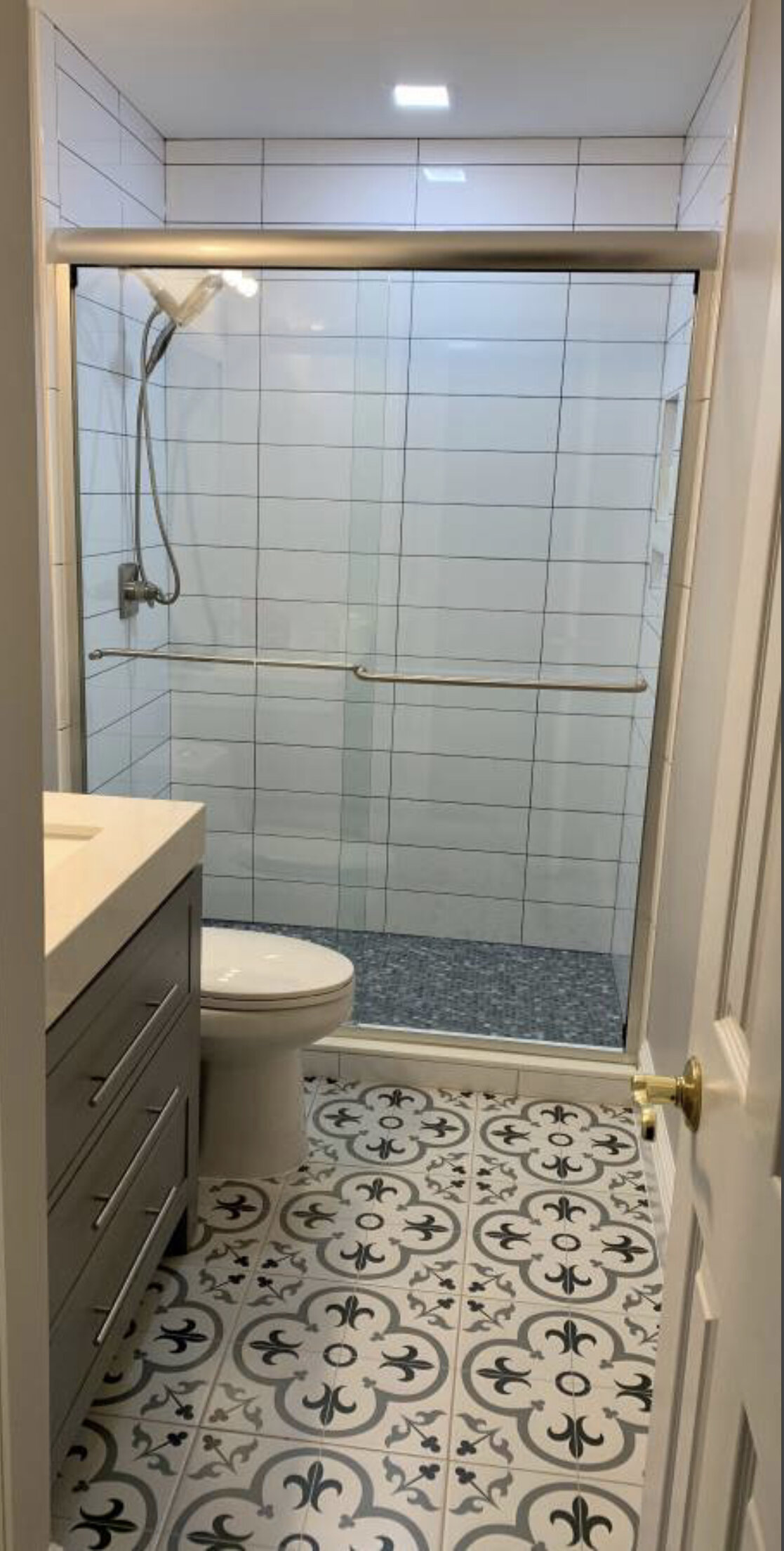 patterned tile, gray vanity bathroom remodel lotus home improvement.jpeg